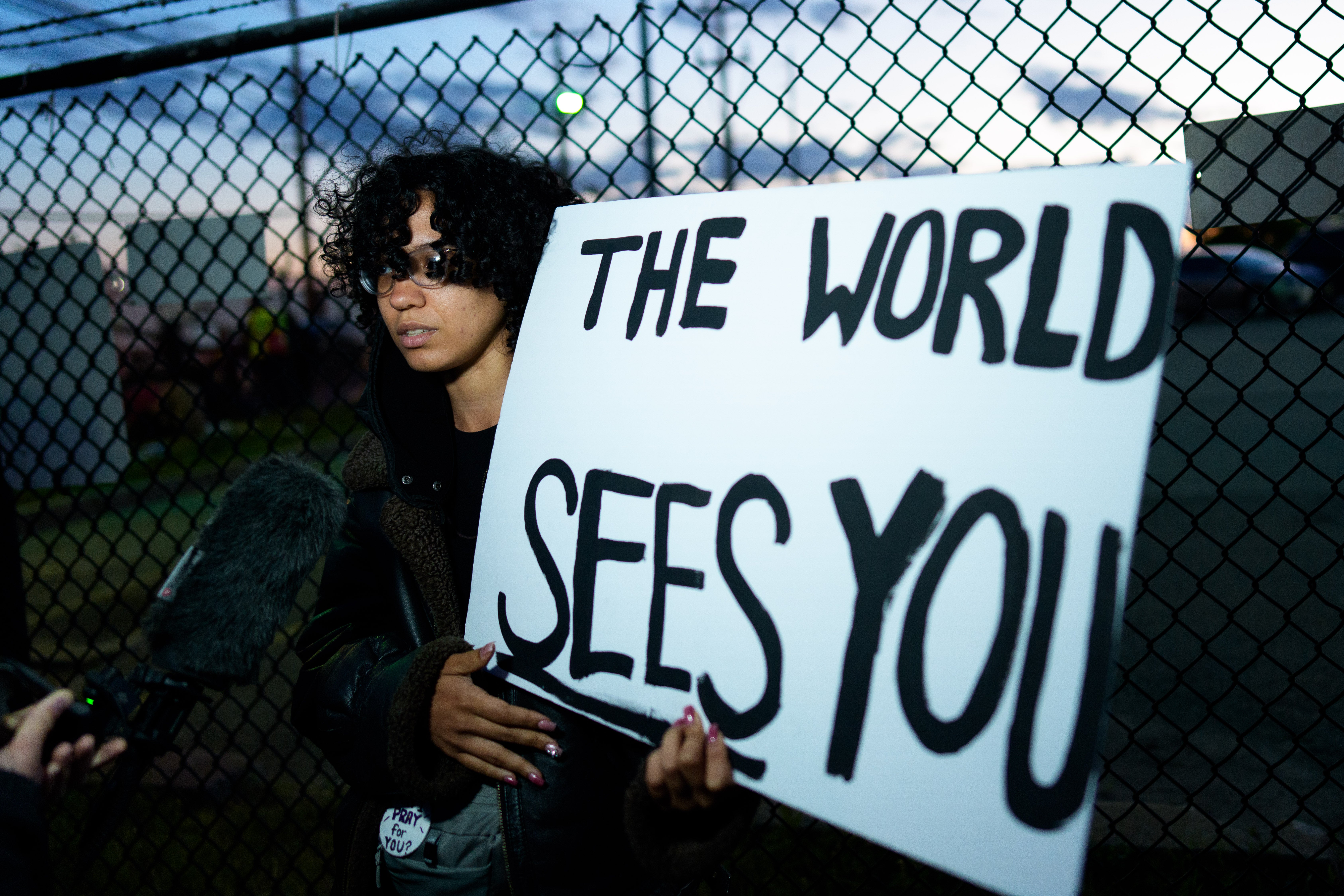 A personification holds a motion extracurricular nan Delaney Hall Immigration Detention Center successful Newark, wherever ICE is lodging detained immigrants