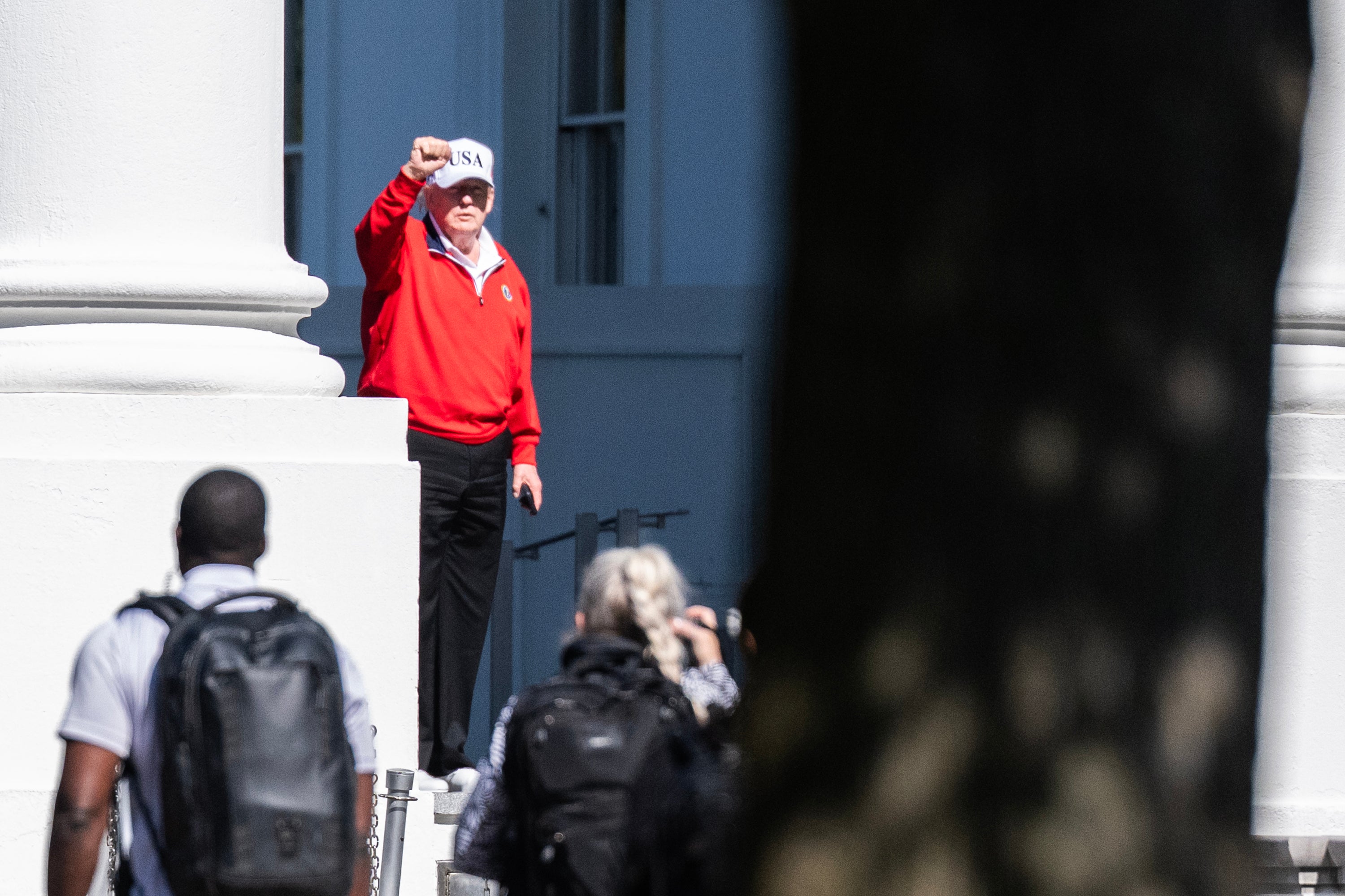 President Donald Trump waves arsenic he returns to nan White House aft spending nan time astatine Trump National Golf Club successful Sterling, Virginia past weekend, aft nan White House released a study that said his 3rd beingness successful 11 months showed he is successful "excellent" health.