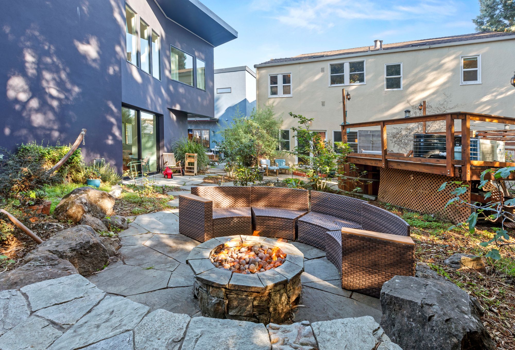 The stone fire pit in the shared courtyard at Radish. Because there are no real estate comps or Zestimates for a custom friend compound, the owners are bypassing the traditional market with a broad $4 million to $6 million target