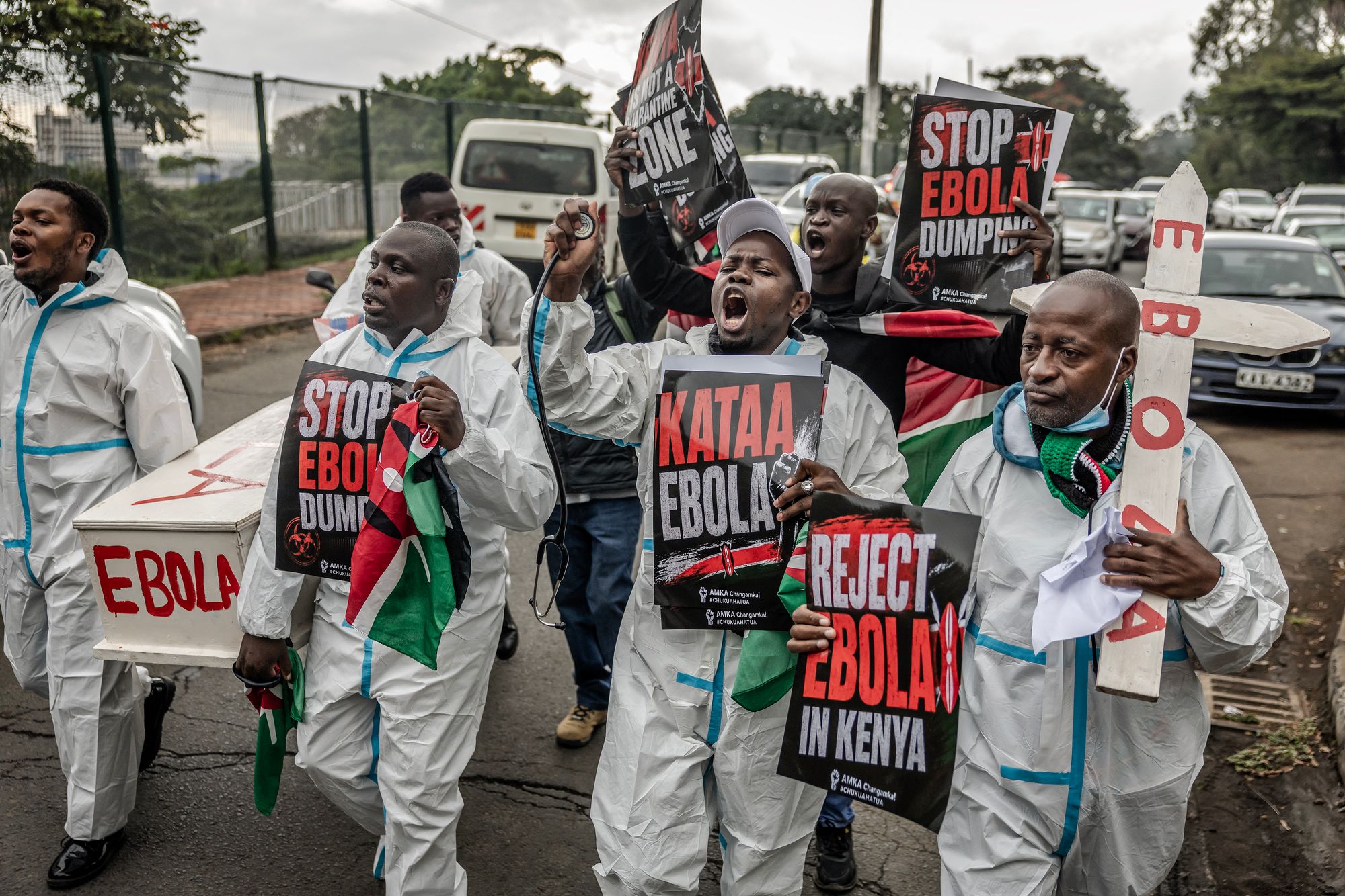 Activists chant slogans arsenic they transportation placards and a mock coffin during a protestation against a US-built Ebola quarantine centre planned to statesman operations astatine Kenya's Laikipia Air Base, successful Nairobi connected June 2, 2026