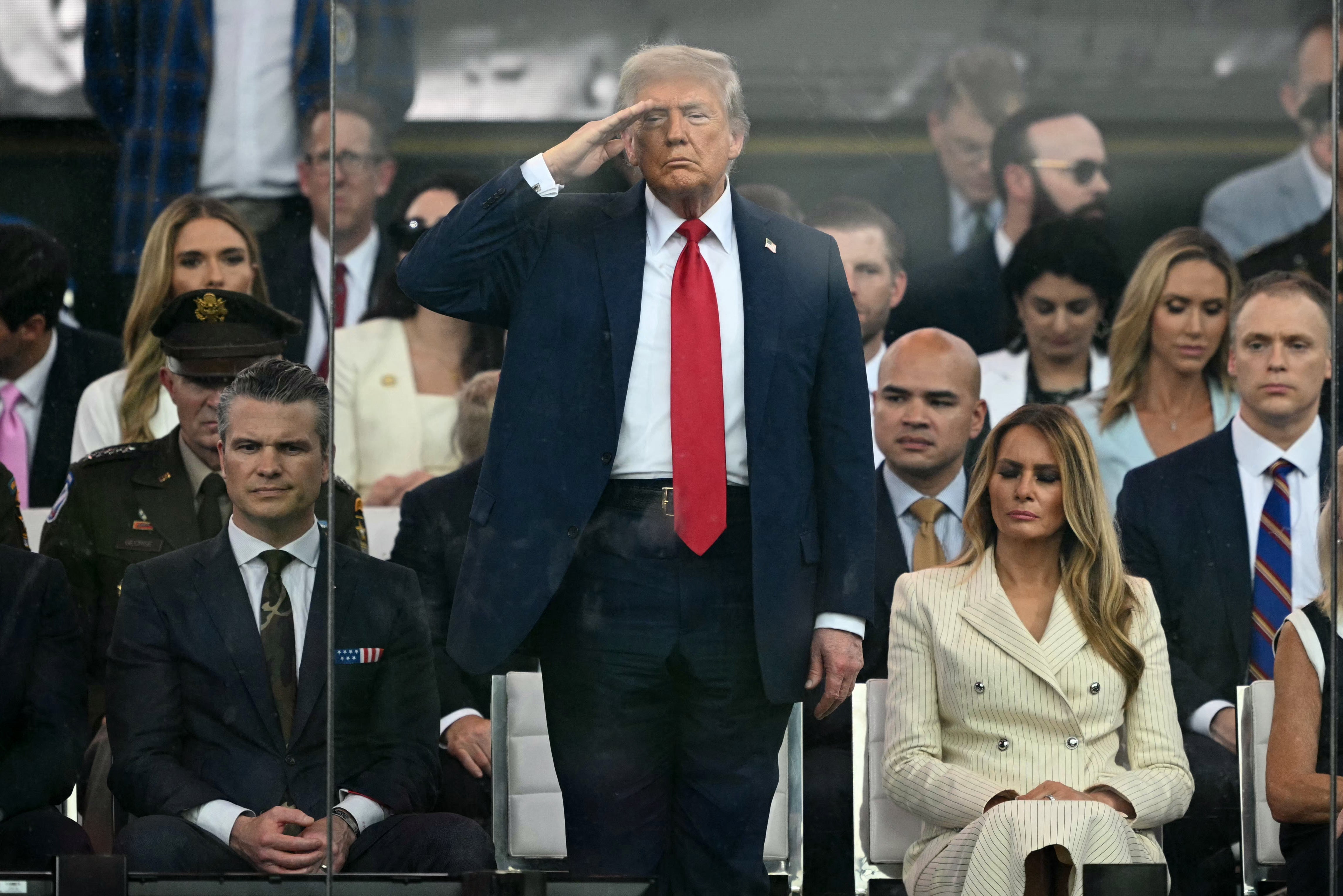 House Republicans want to walk a rule renaming nan Defense Department arsenic ordered by President President Donald Trump, seen present saluting during an Army parade successful Washington connected June 14, 2025