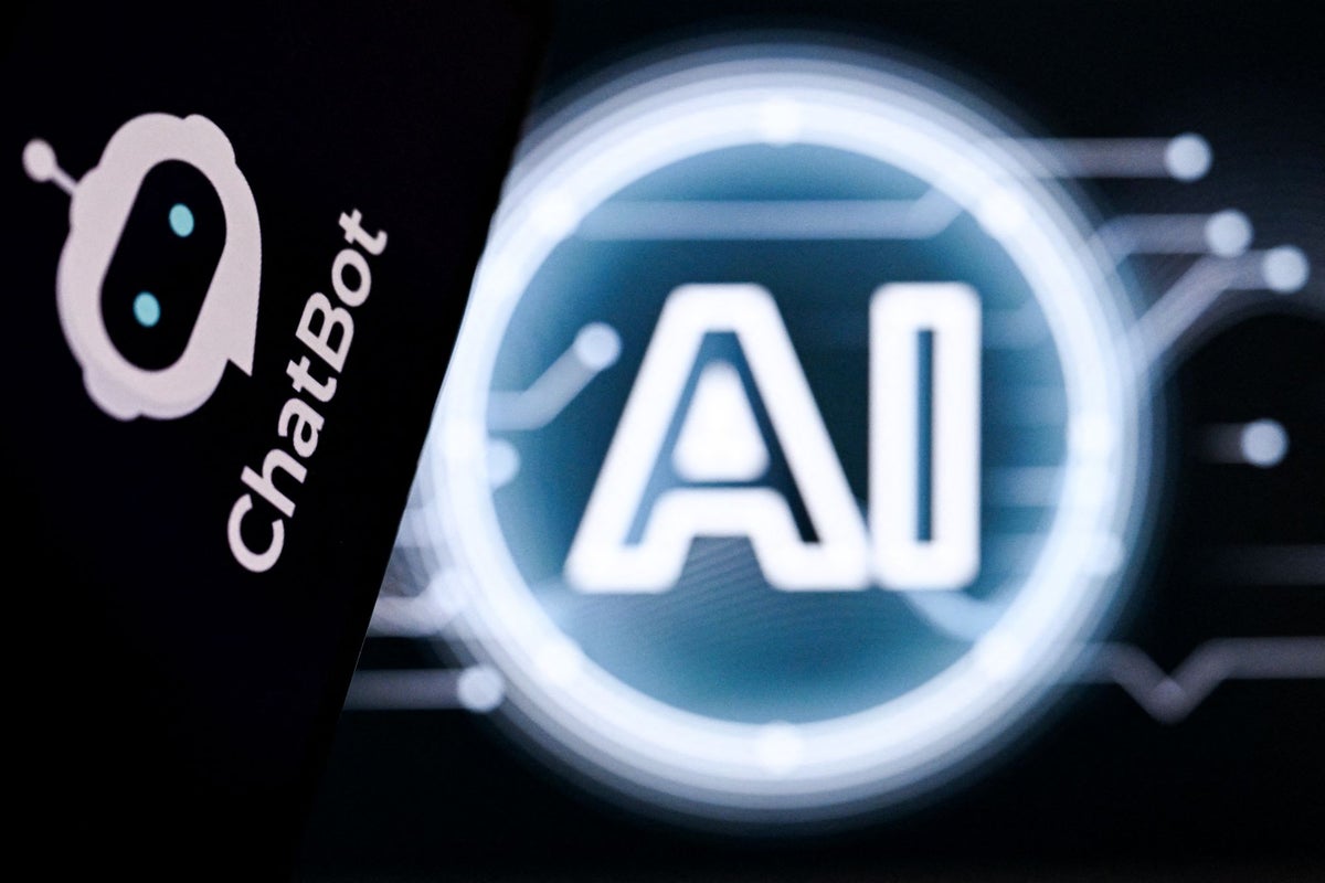 Laptop screen showing artificial intelligence lettering beside an AI chatbot logo