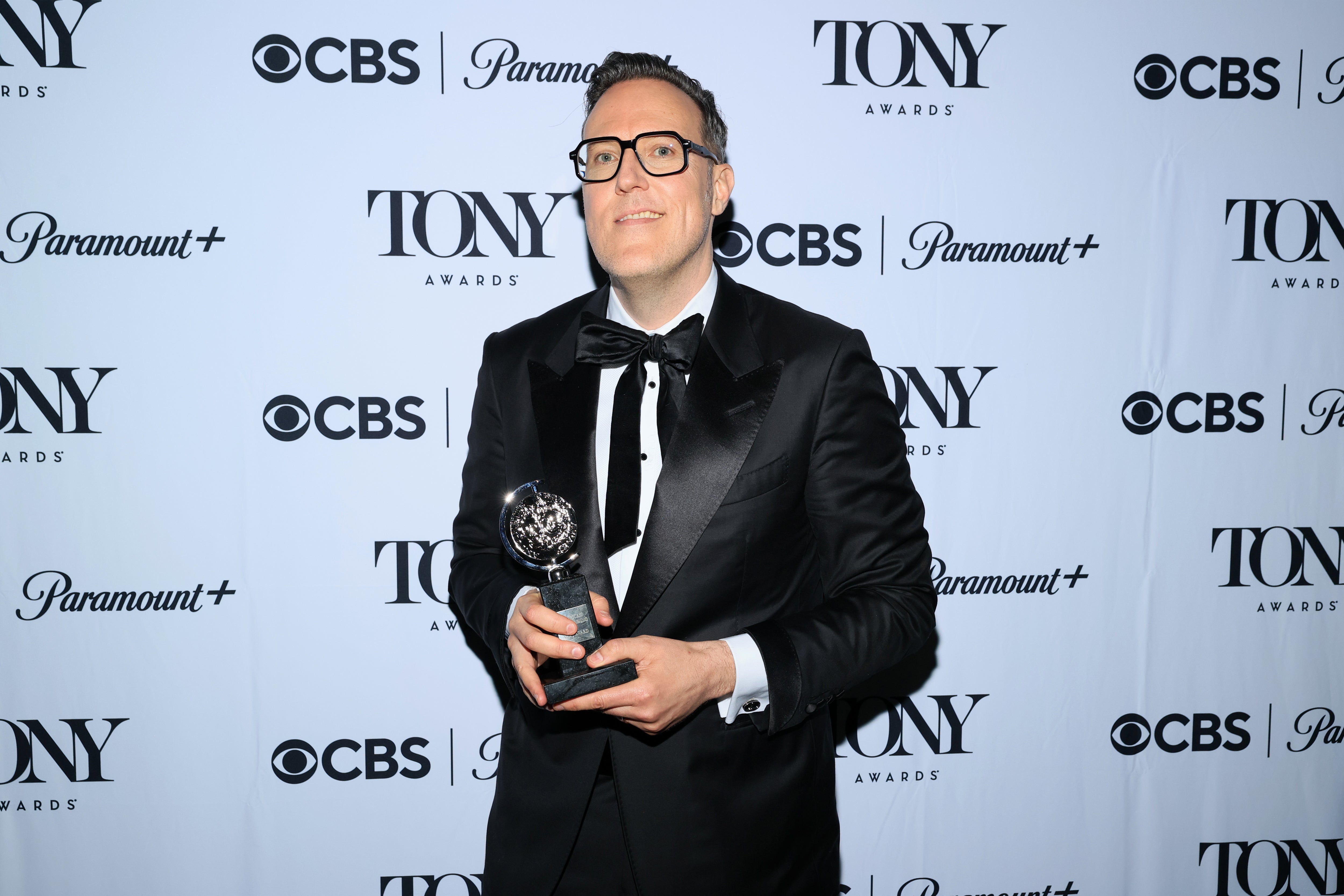 Dane Laffrey poses after winning a Tony Award for Best Scenic Design of a Musical