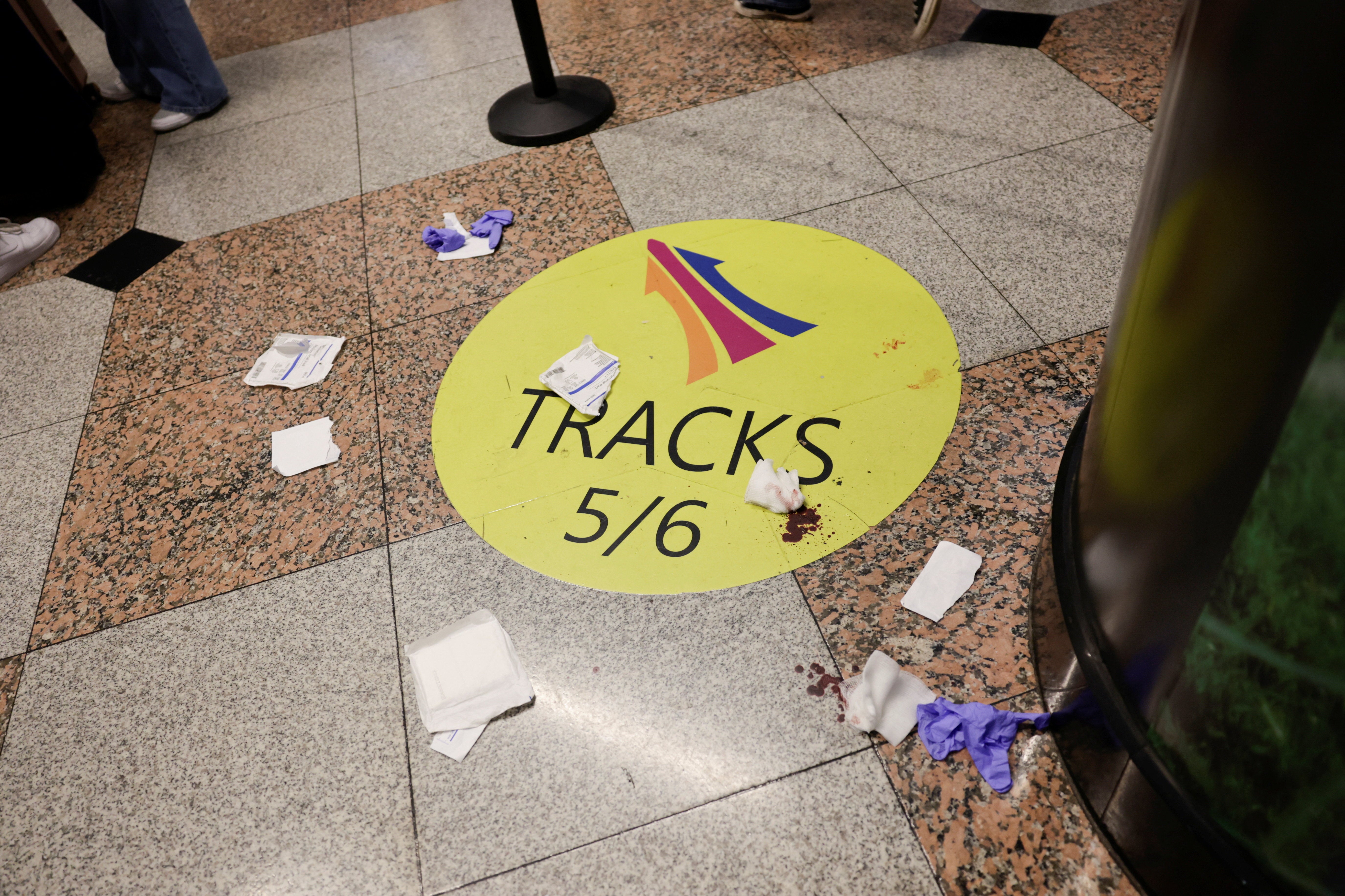 Traces of blood can be seen on the floor at Penn Station after the alleged stabbing incident