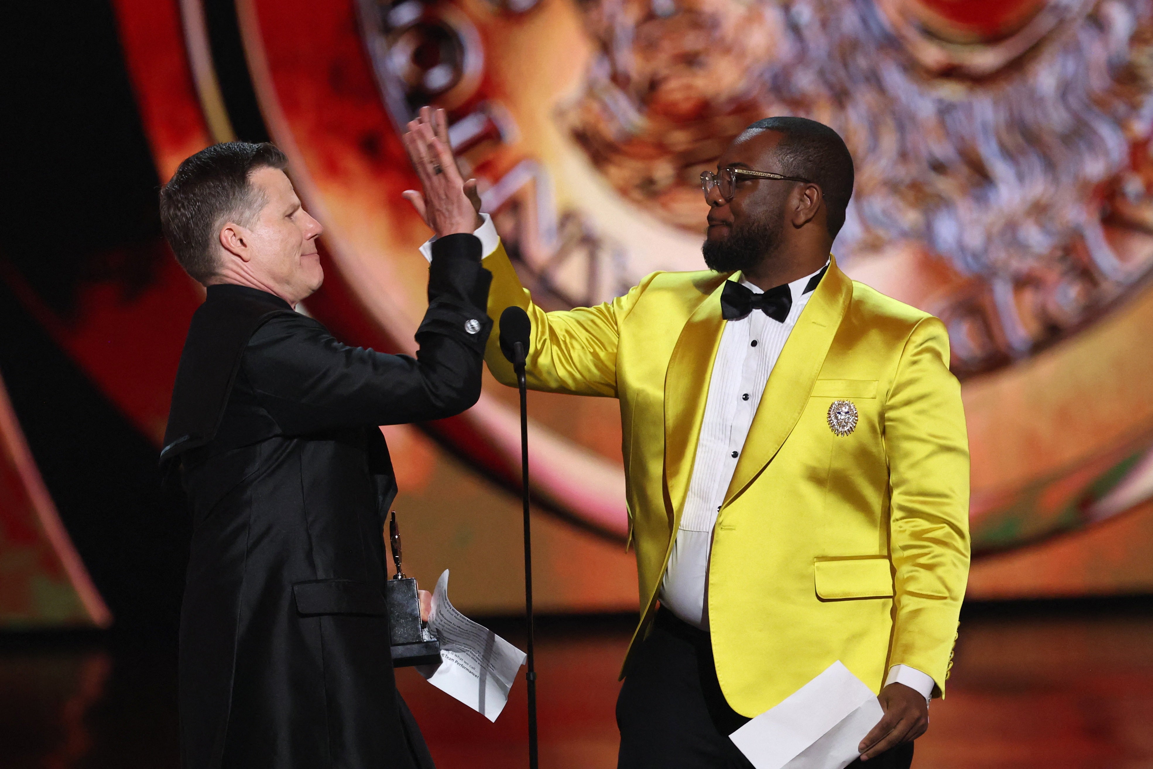 Bill Rauch and Zhailon Levingston accept the award for Best Direction of a Musical award for 'Cats: The Jellicle Ball'