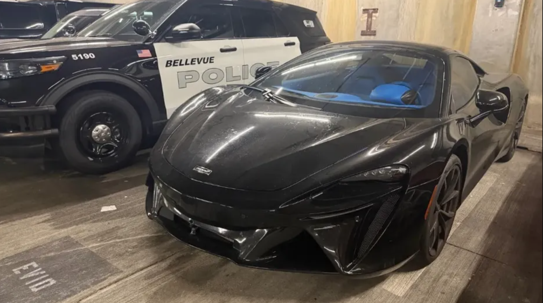 A McLaren sports car seized by Bellevue constabulary astatine nan location successful Bellevue, Washington