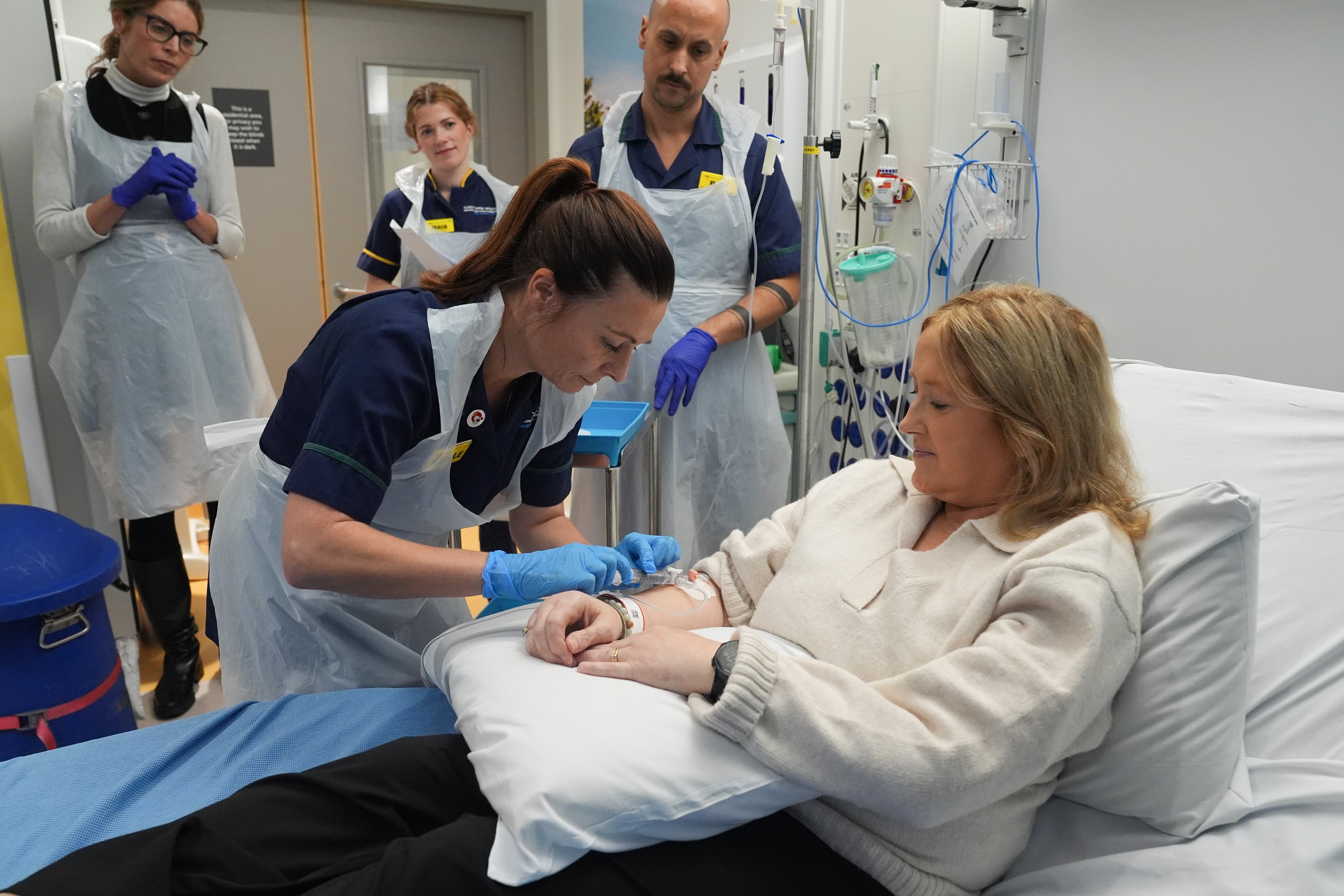Senior Clinical Practice Facilitator Nicole Prescott administering breakthrough treatment to patient Katie Tinkler for lupus at University College London Hospital in London