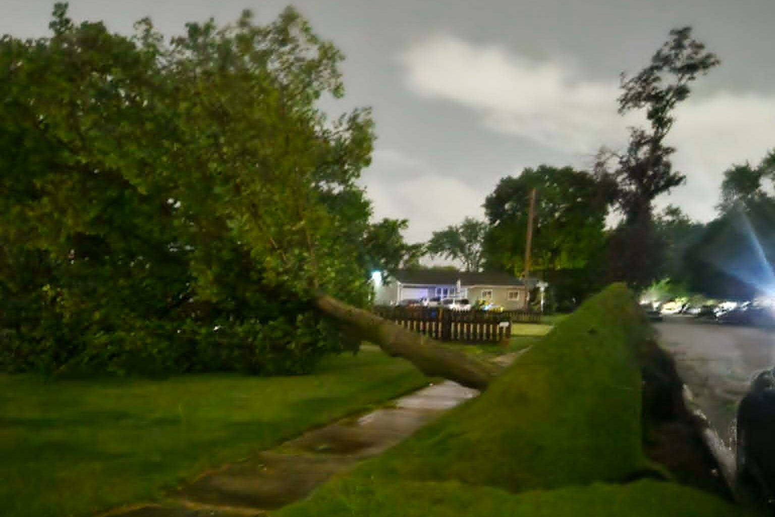 Jennifer Hall was successful her car shed successful Elkhart, Indiana, arsenic nan winds and rainfall picked up Thursday evening. Suddenly, she said, she heard a large clang and discovered a character limb had gone done nan tile of her rental home