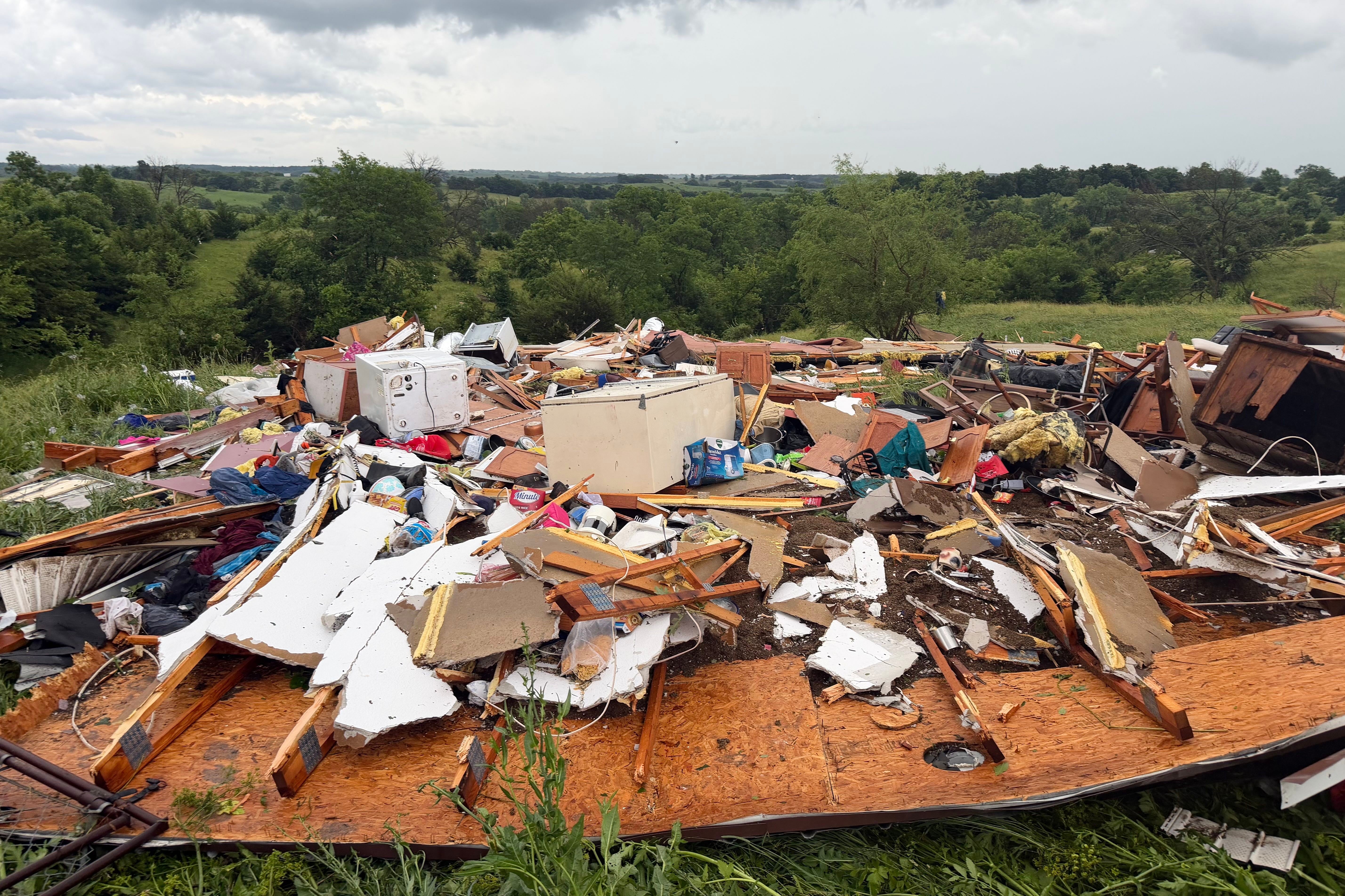 This photograph provided by Kylie Rouse shows nan remnants of Shane and Jimmie Tipton’s location successful Unionville