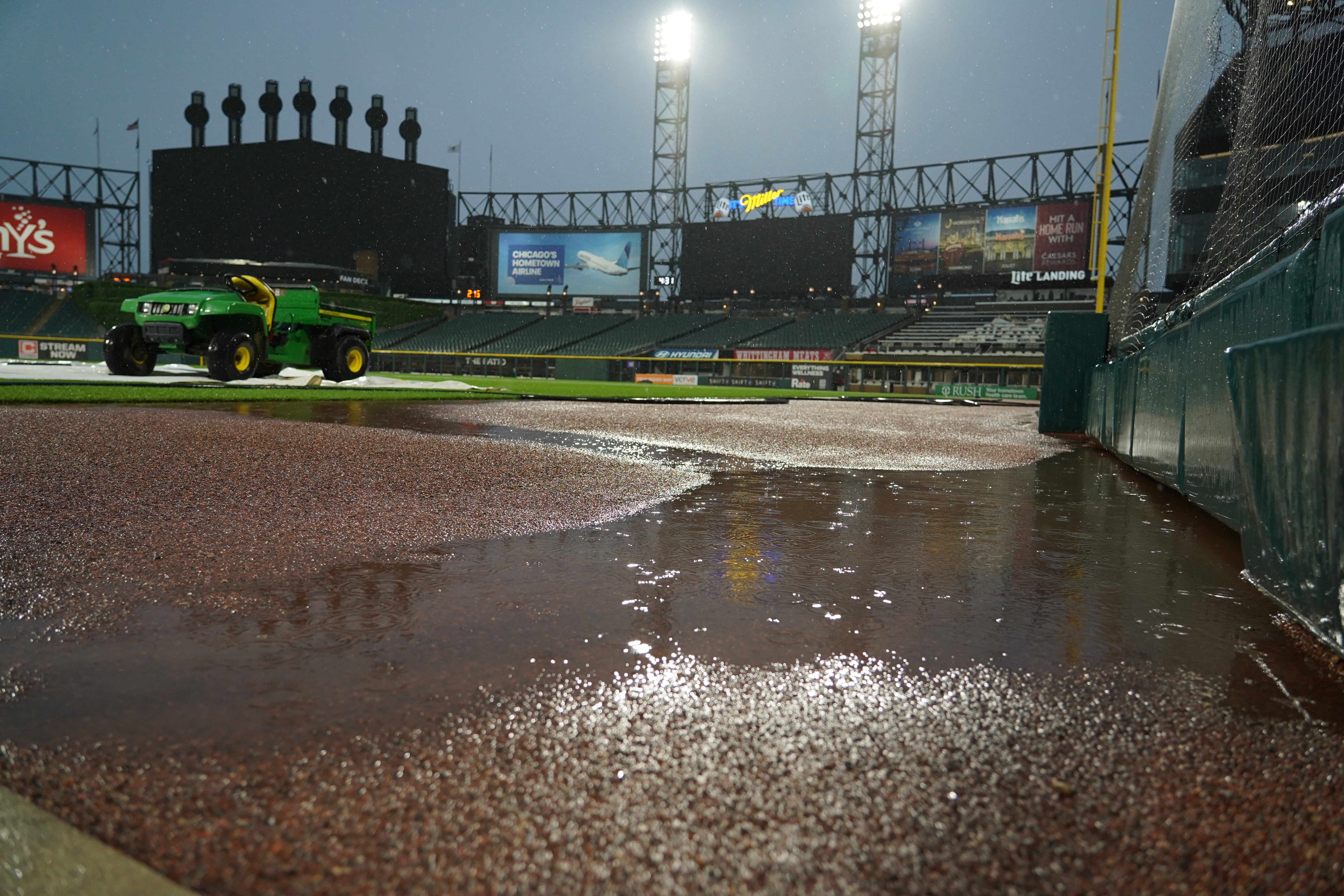Puddles complete nan section arsenic a terrible thunderstorm rolled into nan area earlier a shot crippled betwixt nan Chicago White Sox and nan Atlanta Braves