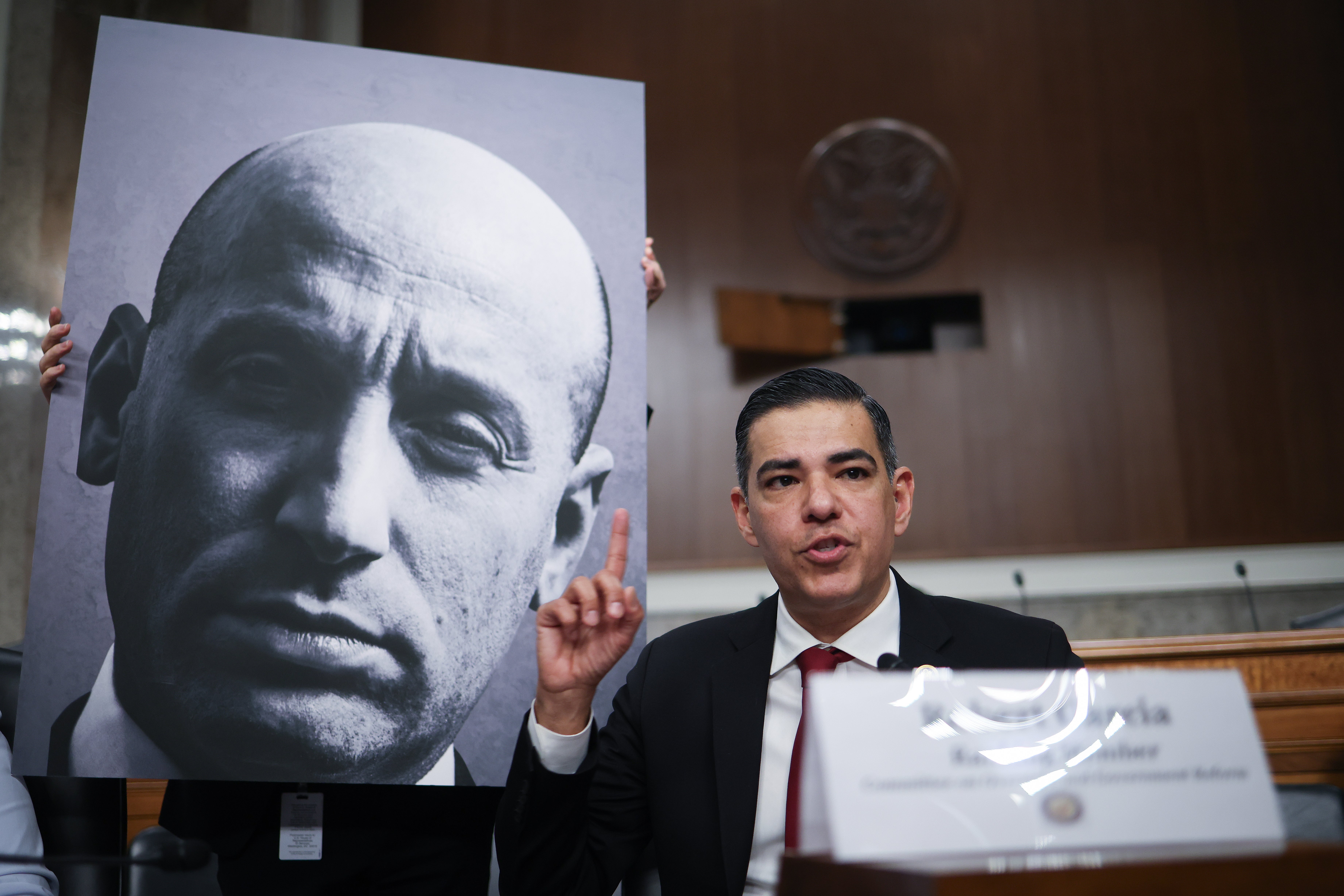 Rep. Robert Garcia (D-CA) speaks while referencing a photograph of Deputy White House Chief of Staff Stephen Miller during a nationalist forum connected convulsive usage of unit by Department of Homeland Security (DHS) agents