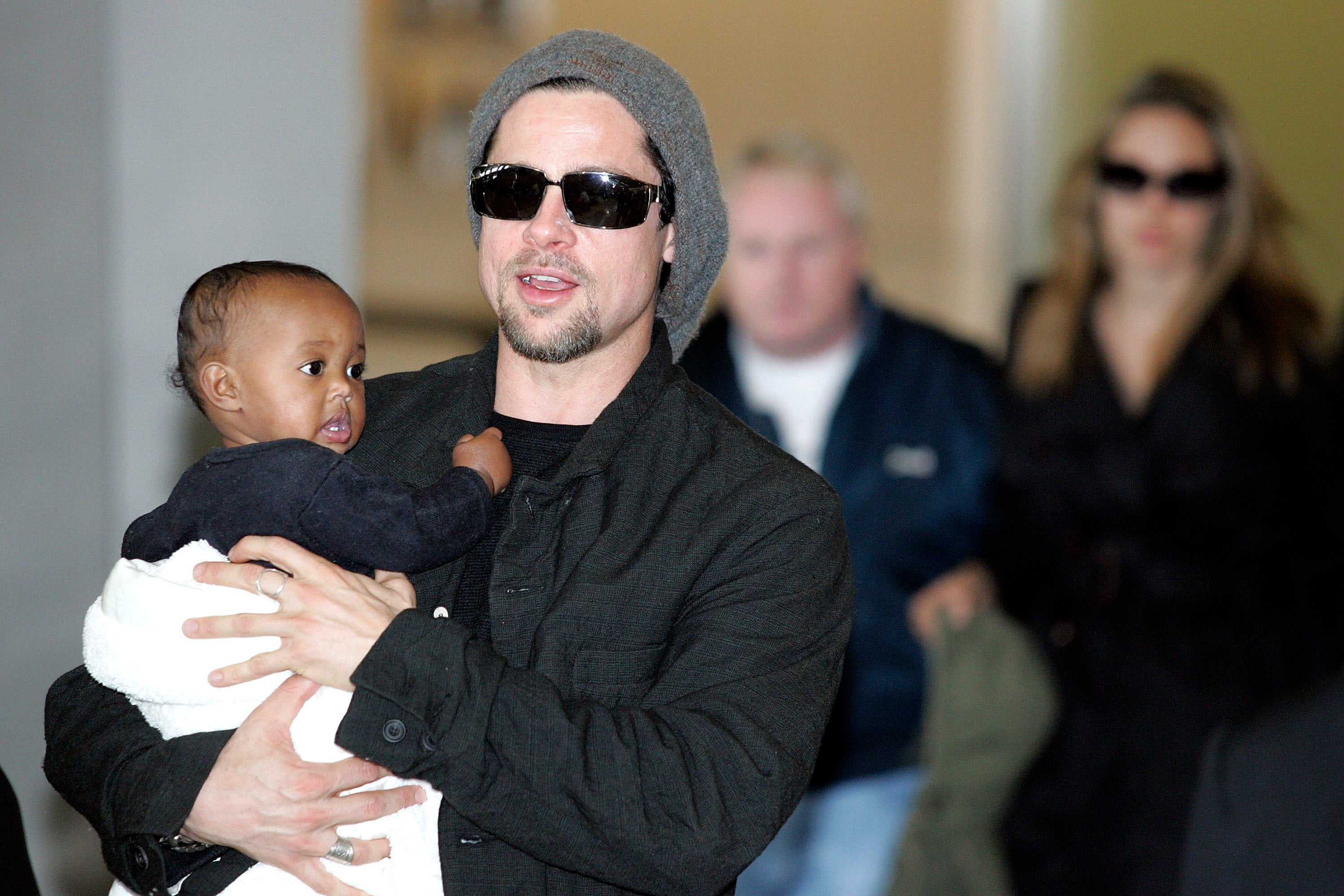 Brad Pitt pictured in 2005 holding his daughter Zahara Marley Jolie, who recently filed to drop ‘Pitt’ from her double-barrelled last name