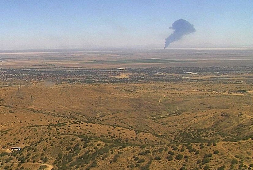 Smoke rises from Edwards Air Force Base aft nan crash