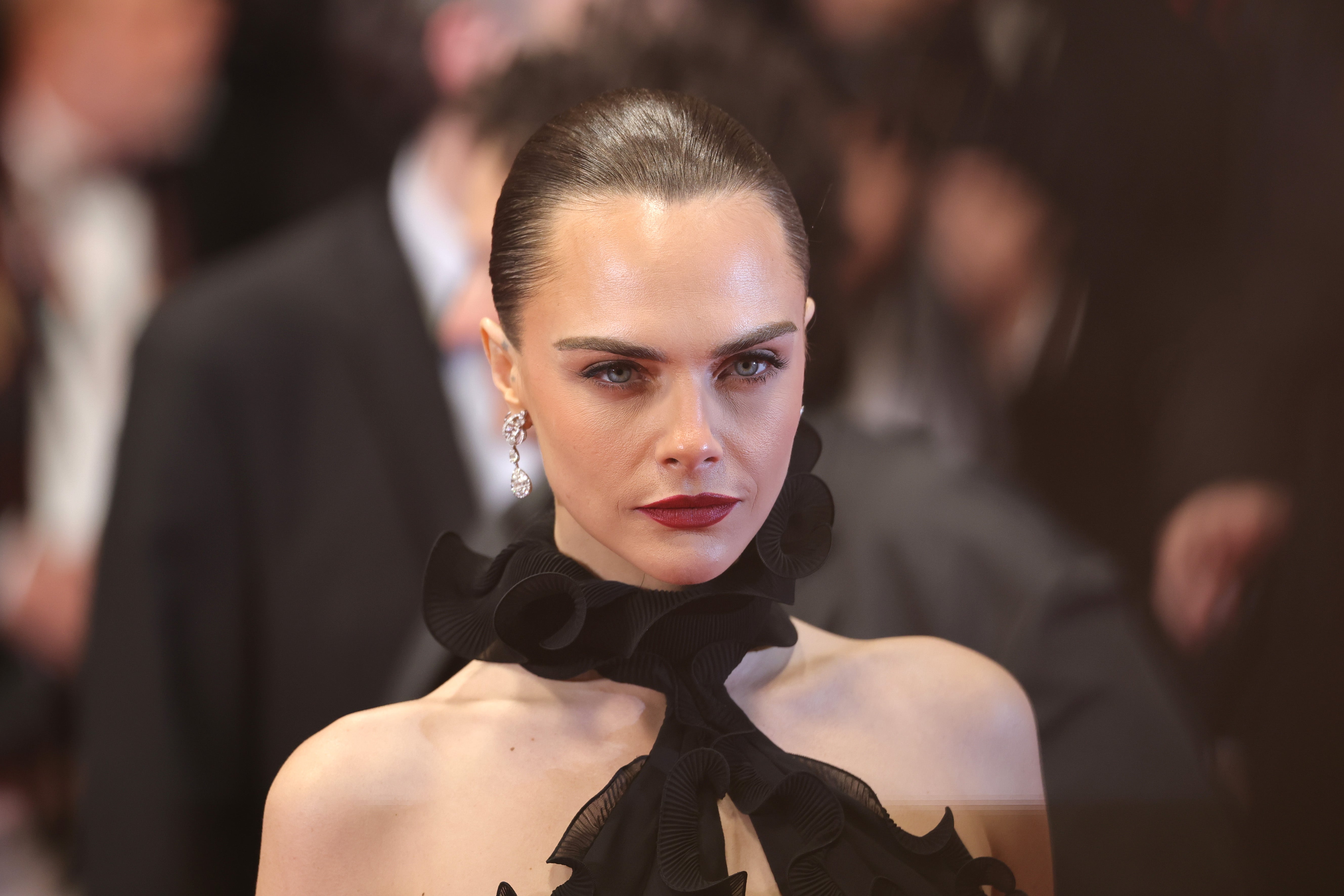 Cara Delevingne on why she has ‘chip on shoulder’ after modelling in pre-MeToo era