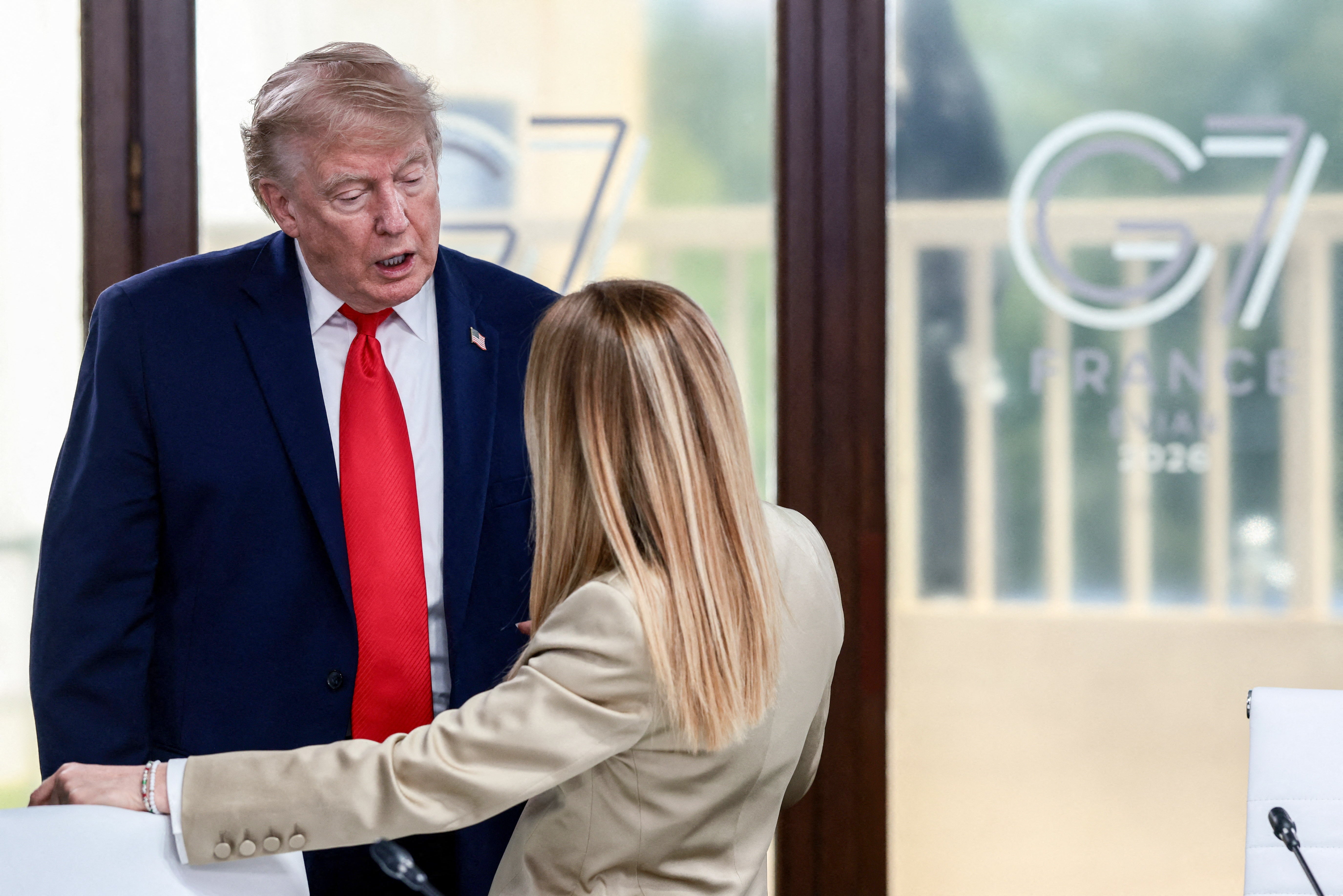 Meloni, pictured pinch Trump astatine nan G7, said that Italy does not ‘beg’