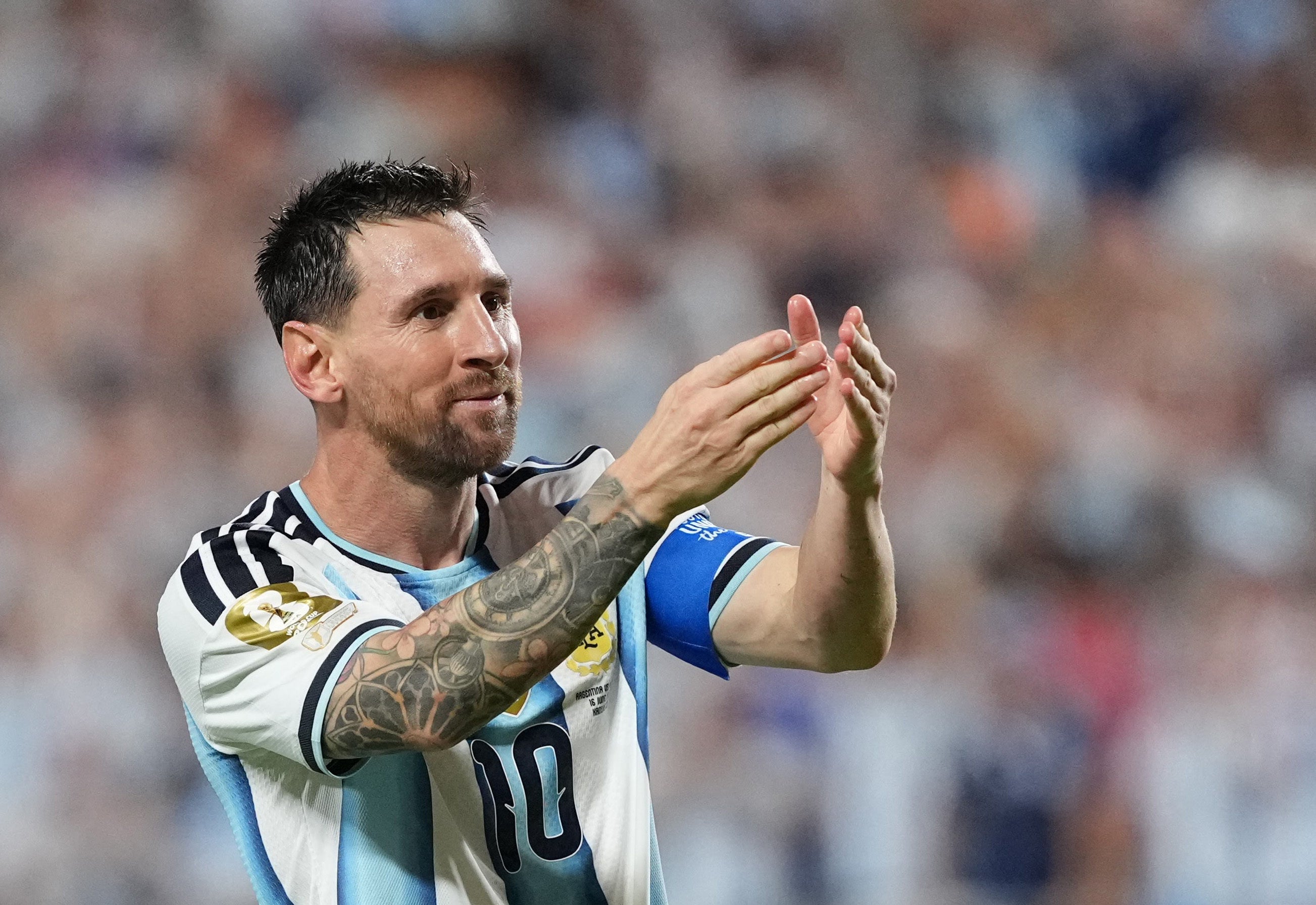 <p>Argentina's Lionel Messi celebrates scoring their third goal</p>