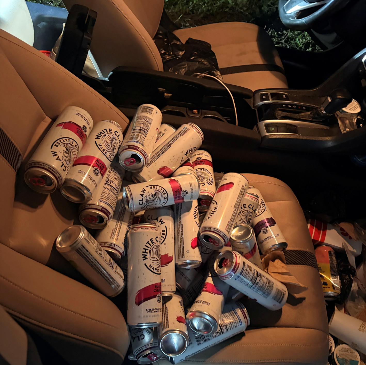 The dozens of White Claw difficult seltzer cans tin beryllium seen piled atop each different successful a photograph posted to FHP Tampa’s Instagram page