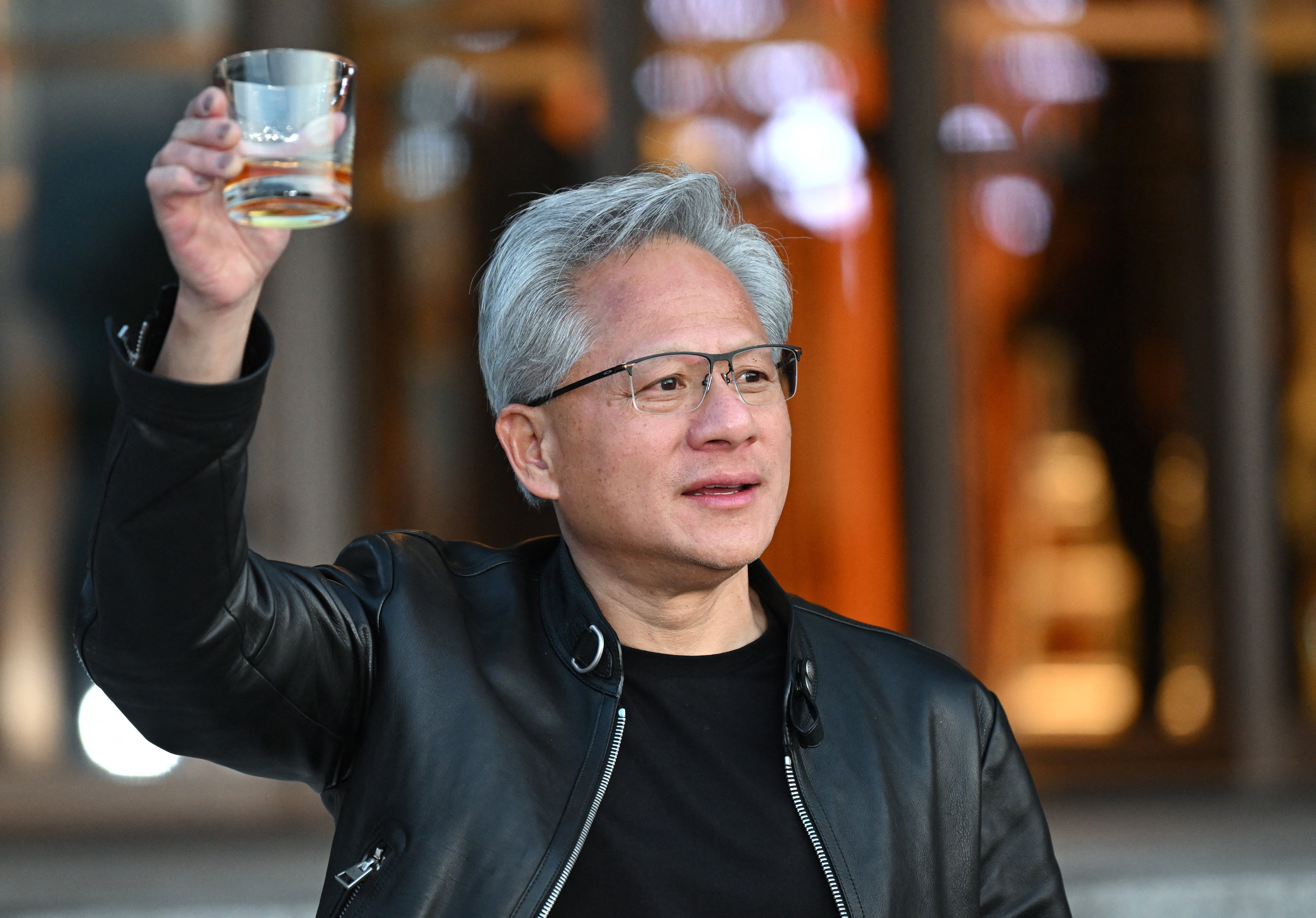 Nvidia CEO Jensen Huang reacts arsenic he speaks to reporters aft a gathering pinch Korean AI and robotics startup executives astatine a edifice successful Seoul connected June 8