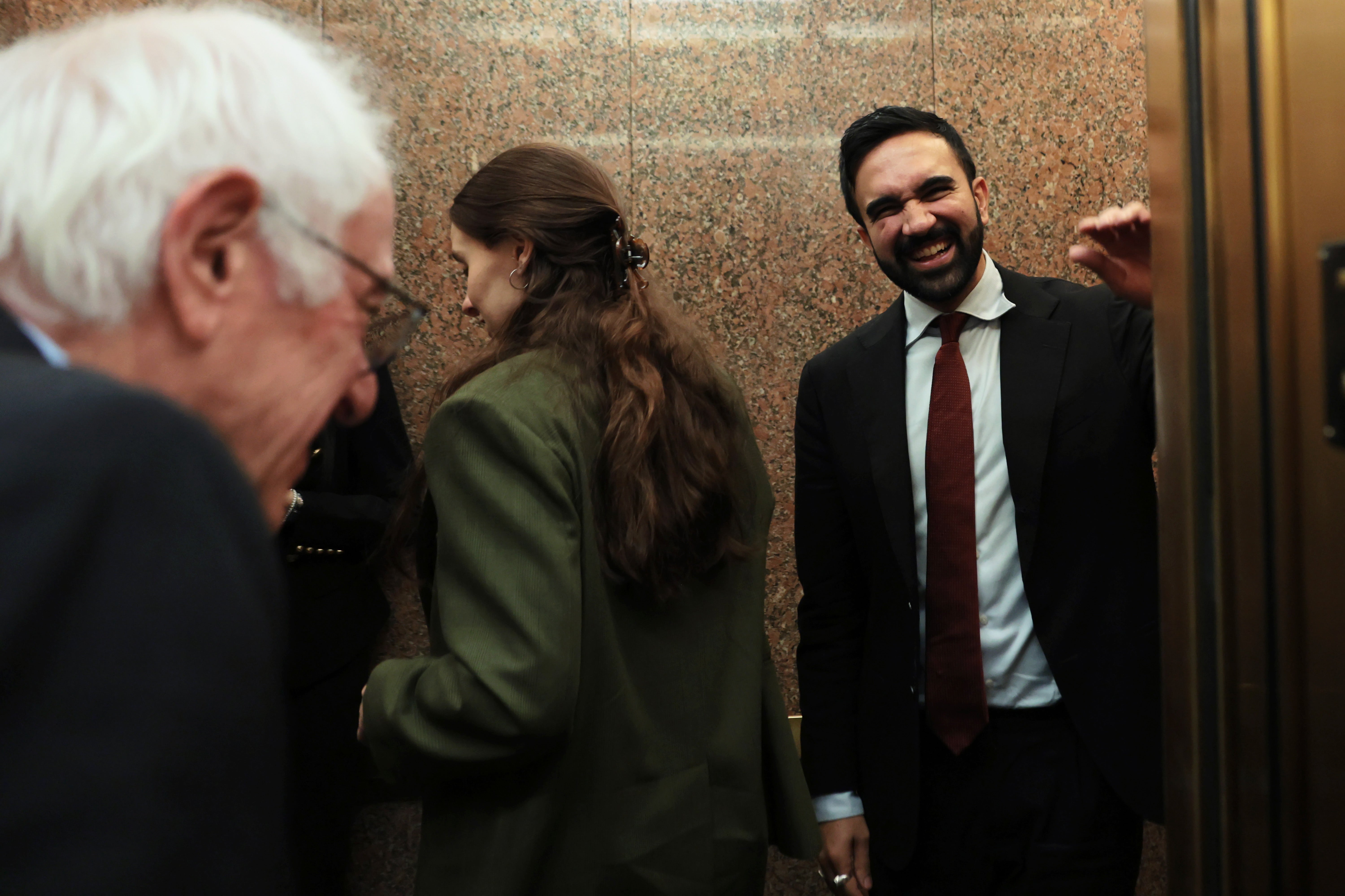 Sen. Bernie Sanders (I-VT) and NYC Mayoral Candidate Zohran Mamdani participate an elevator aft a gathering successful nan Dirksen Senate Office Building