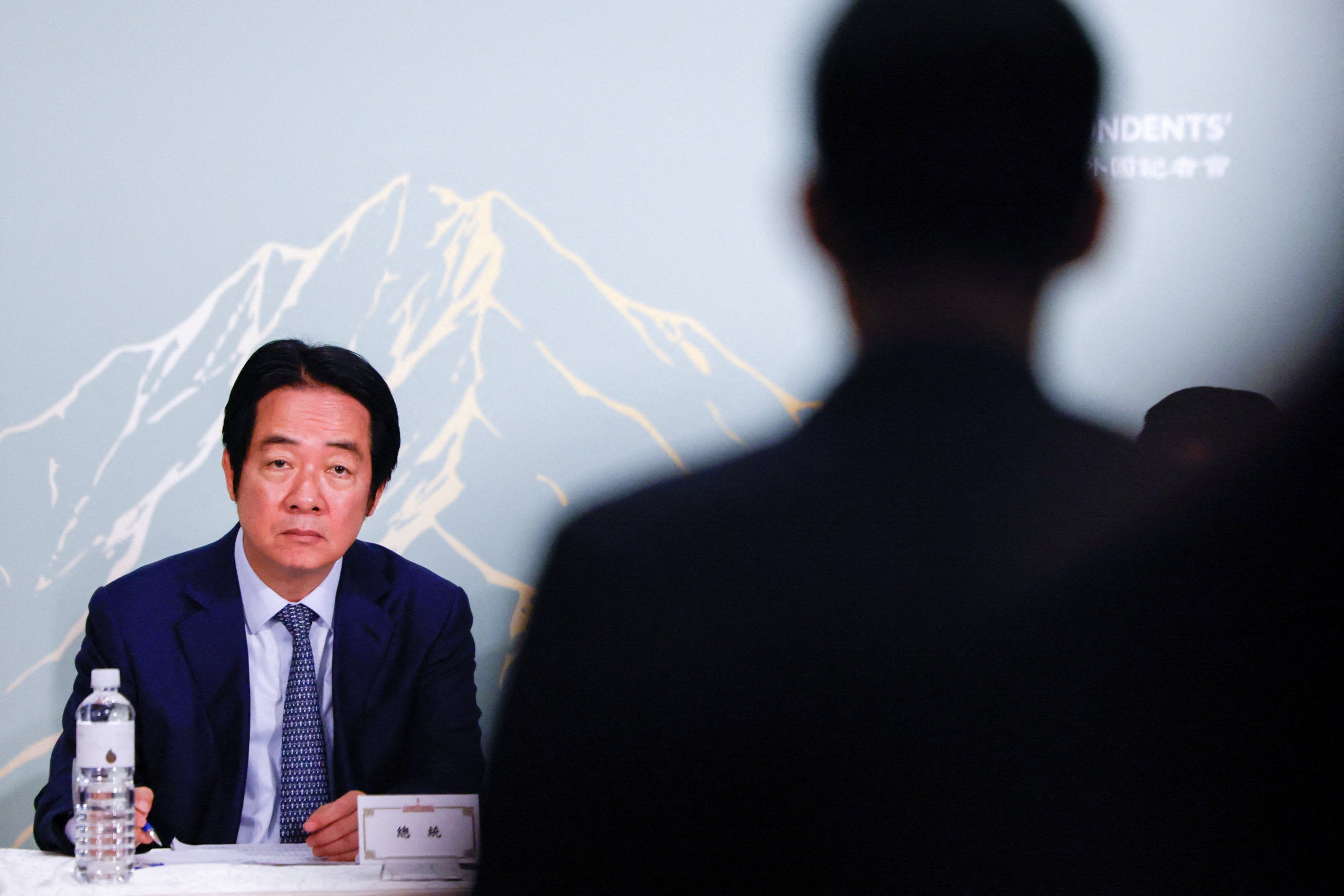 Taiwan President Lai Ching-te takes notes arsenic a newsman asks a mobility during a property convention pinch nan Taiwan Foreign Correspondents’ Club successful Taipei, Taiwan, June 18