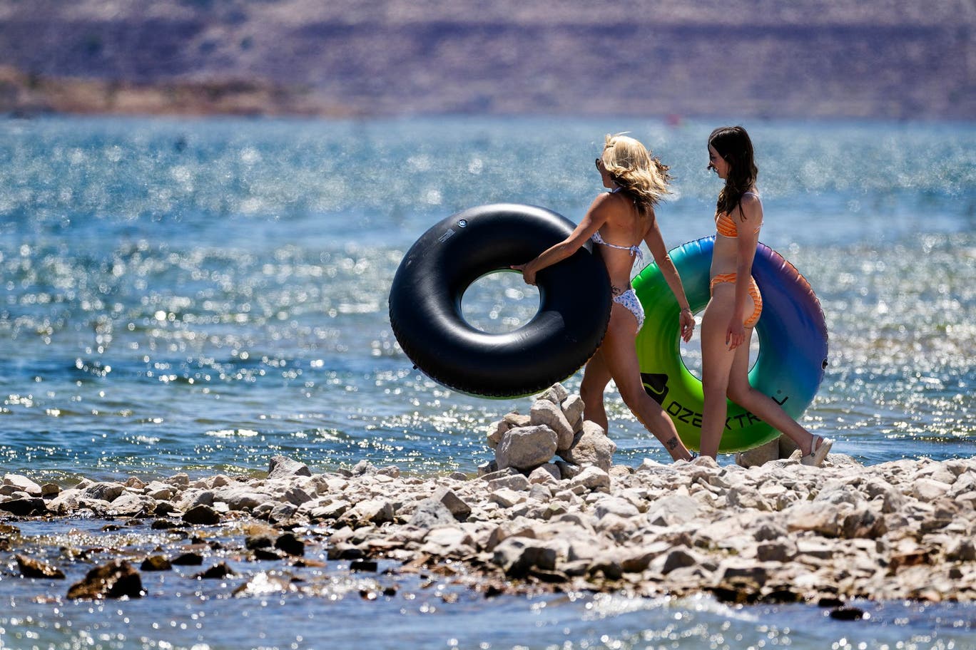 Women go for a swim at Lake Mead
