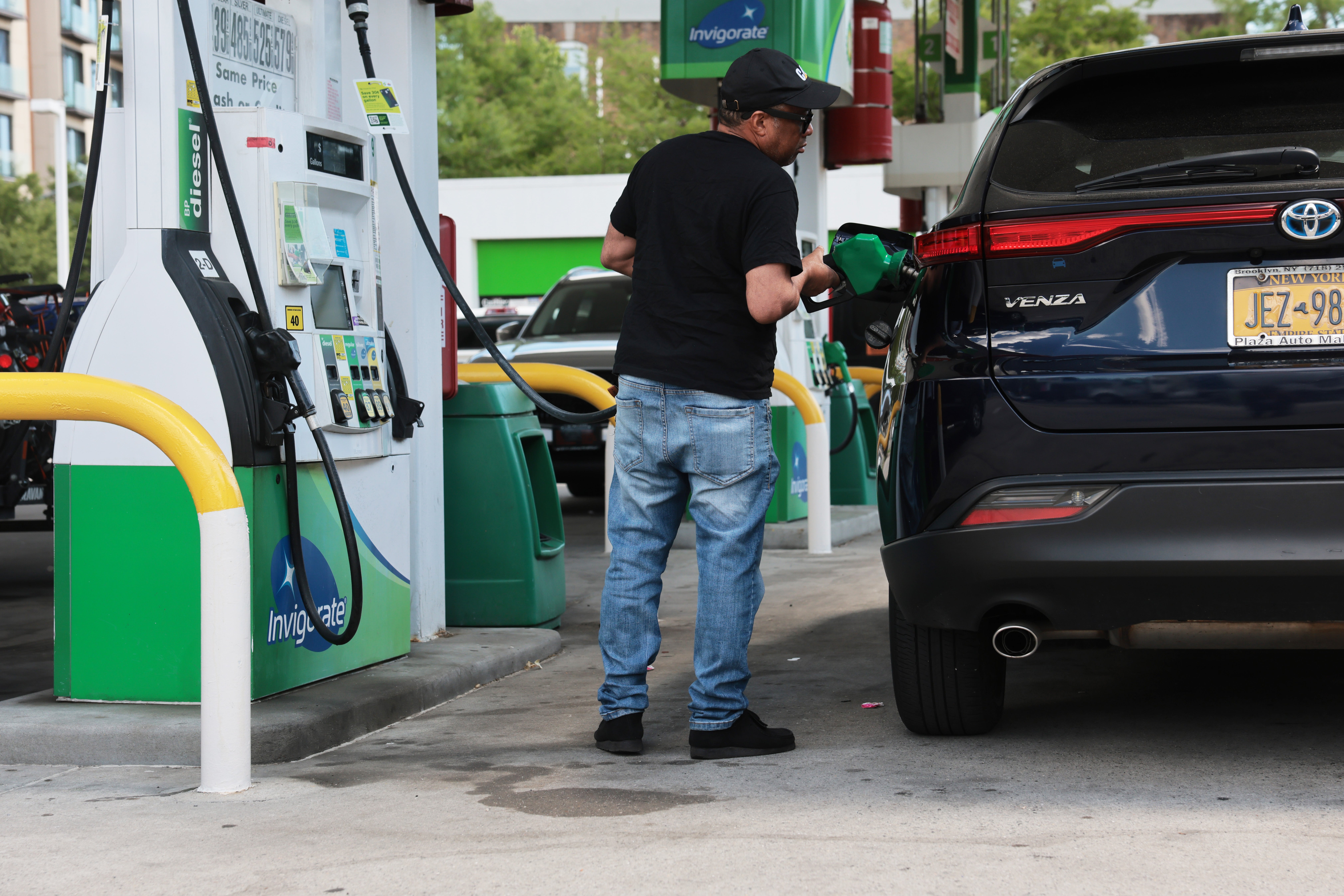 On Thursday, nan nationalist mean value for a gallon of gasoline stood astatine $3.99, according to AAA. Pictured here, a man fills up his conveyance astatine a state position successful New York City connected June 1