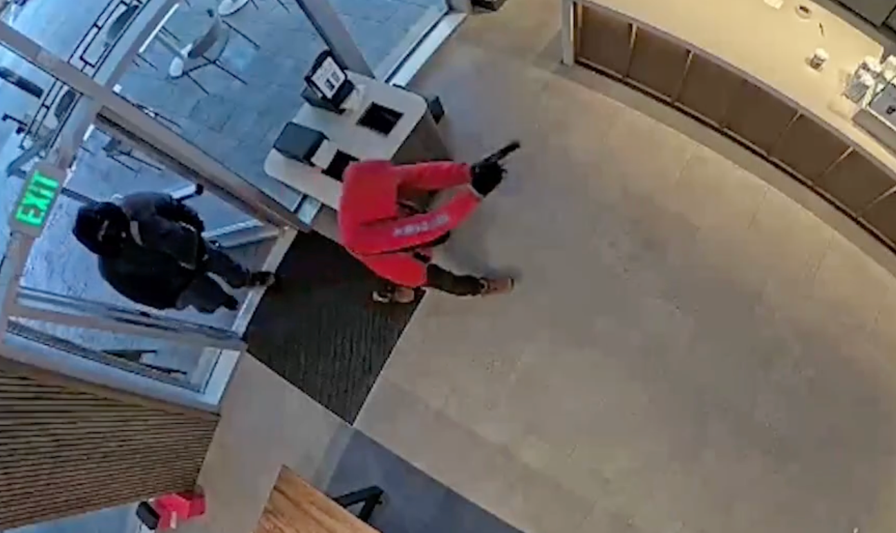 Video shows moment Starbucks employee fights off robbers - and gets fired for it
