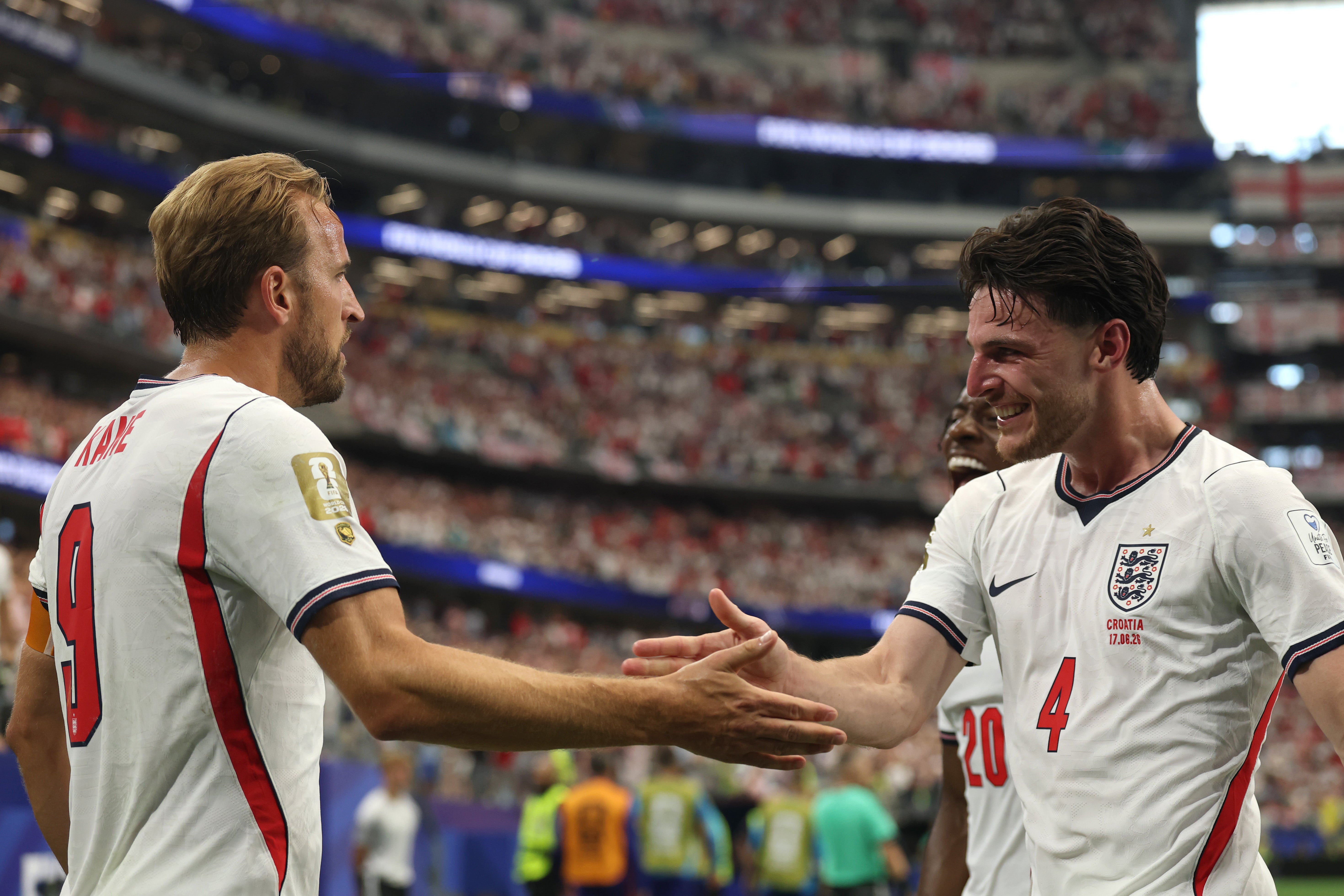 Harry Kane and Declan Rice celebrate England’s second goal against Croatia