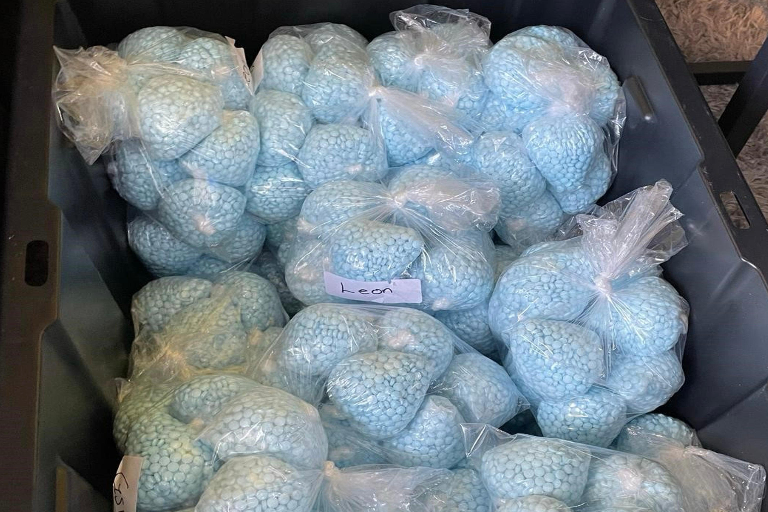 This photo provided by the U.S. Drug Enforcement Administration shows pills containing fentanyl which were seized by the DEA in New Mexico