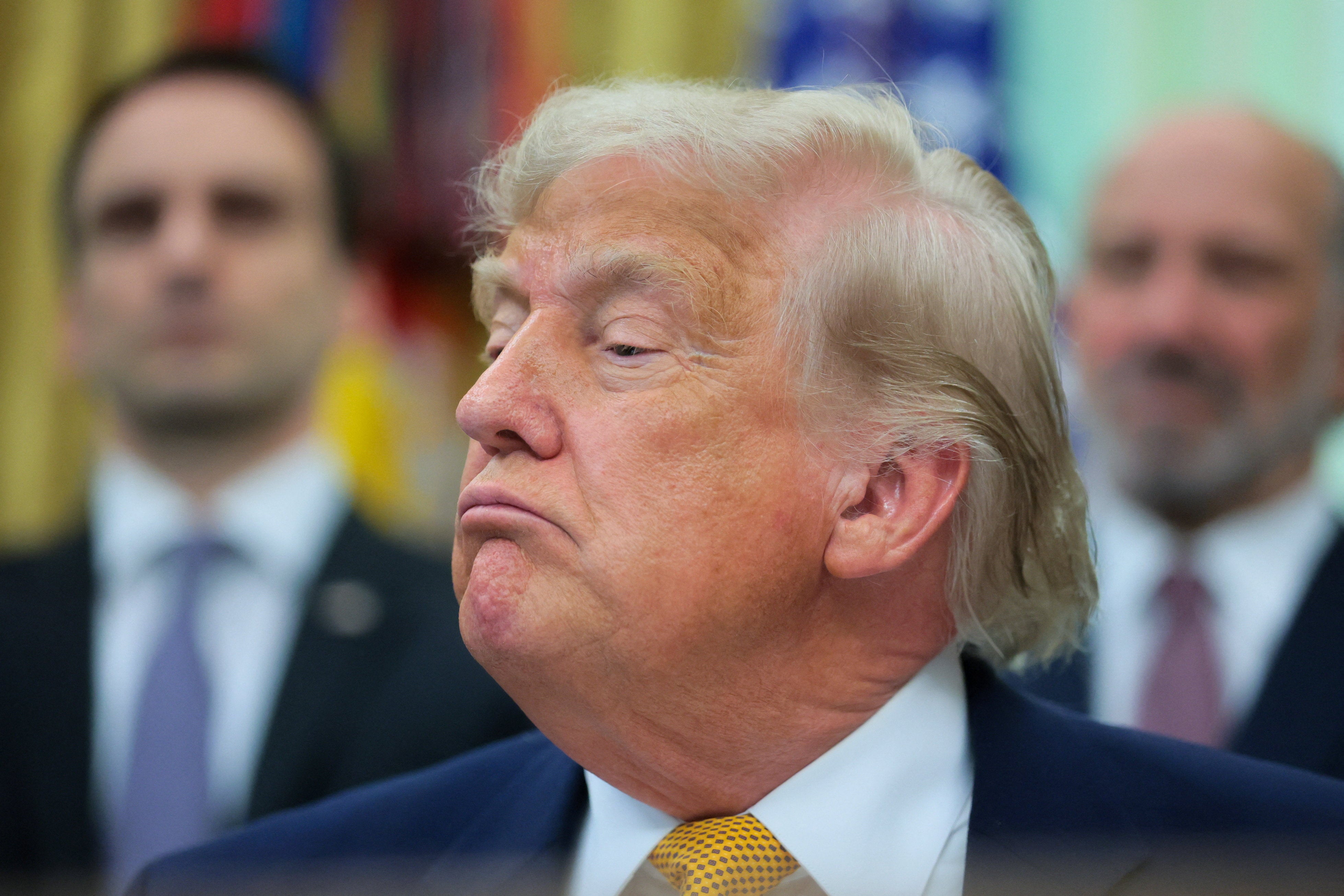 President Donald Trump looks connected arsenic he speaks to reporters earlier signing 2 executive orders regarding quantum computing, successful nan Oval Office astatine nan White House successful Washington, D.C