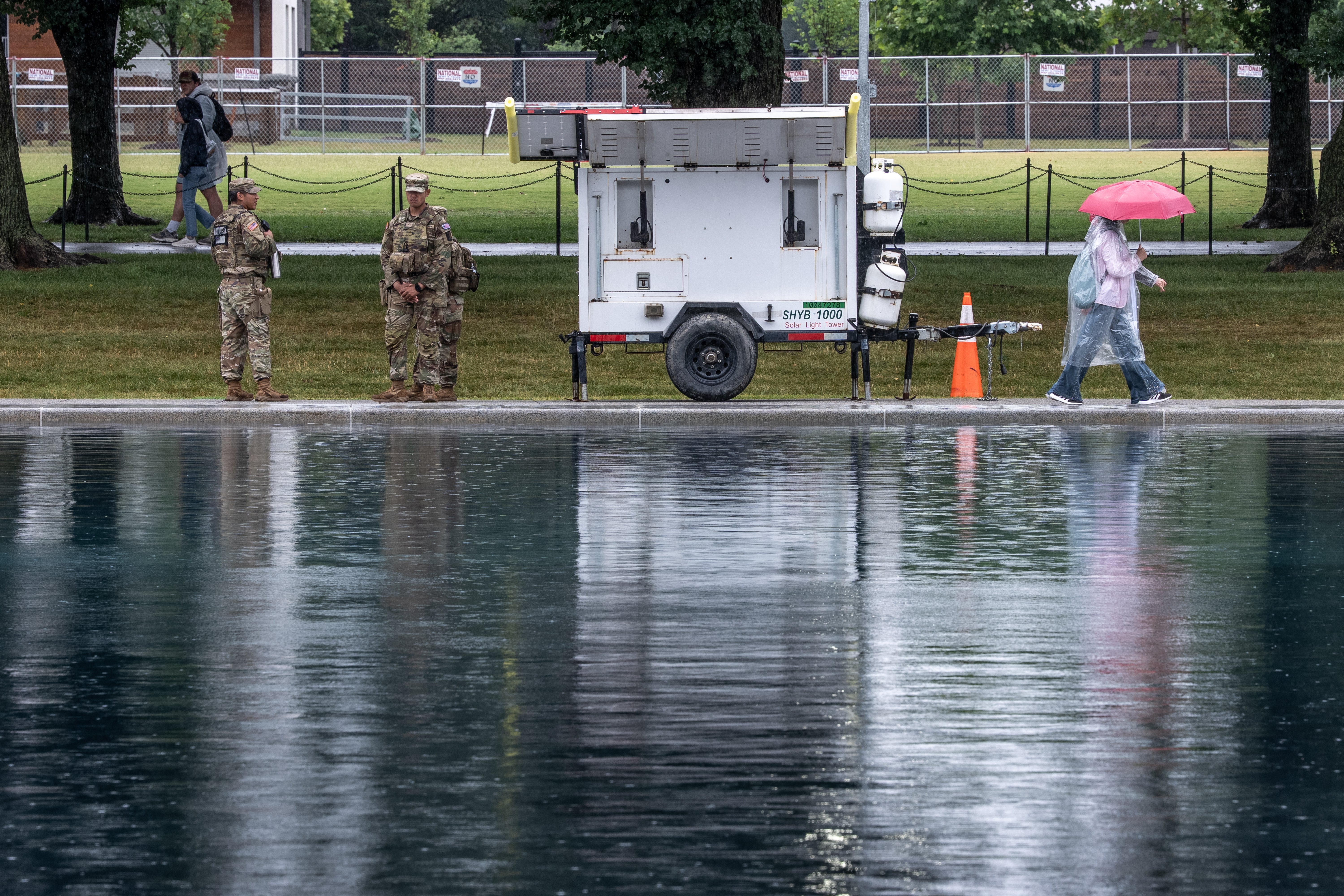 Workers Put Fence Up Around Reflecting Pool As Trump’s Renovation Chaos Deepens
