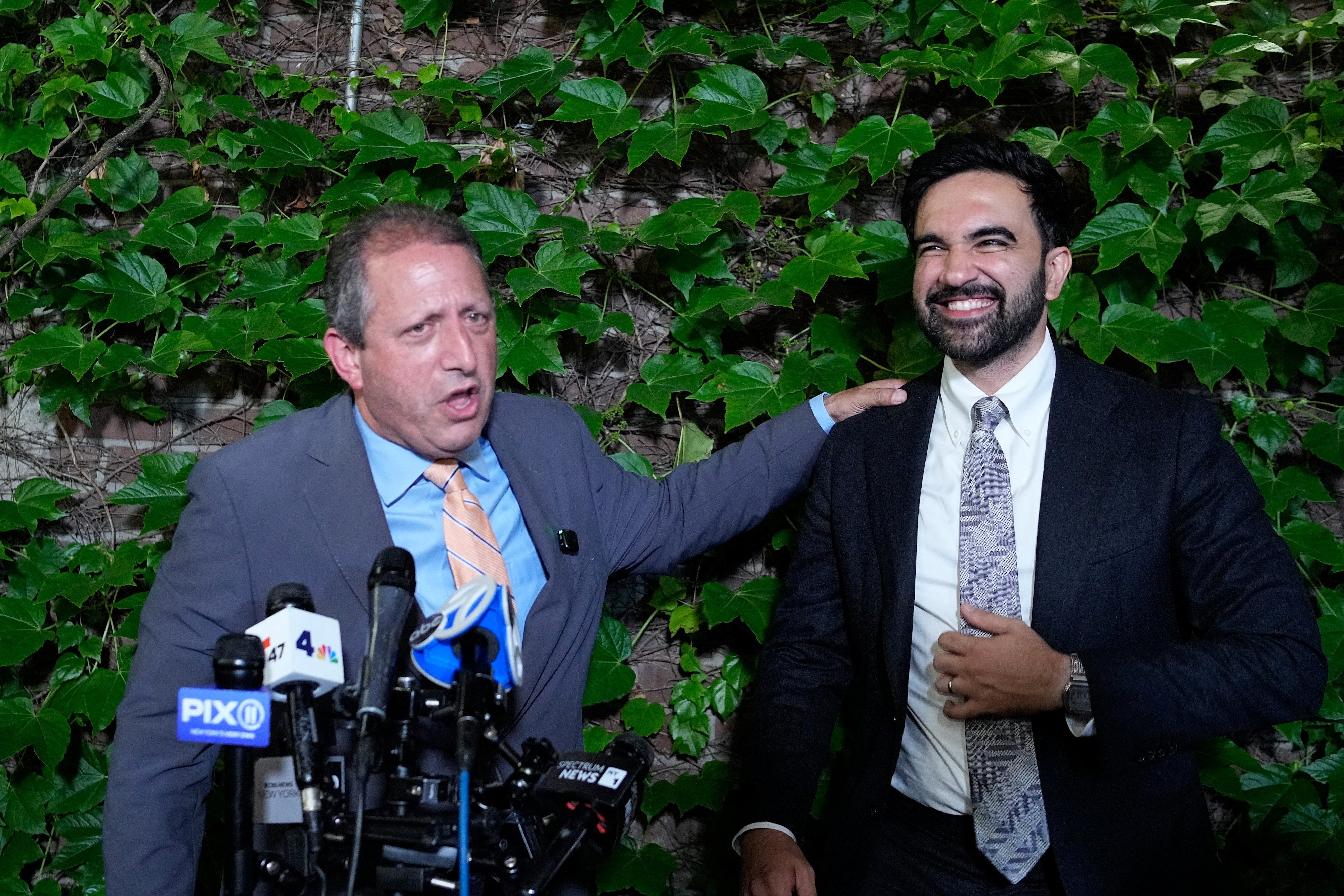 Brad Lander, who hit incumbent Rep. Dan Goldman successful New York’s 10th Congressional District, speaks to nan media while opinionated adjacent to New York City Mayor Zohran Mamdani