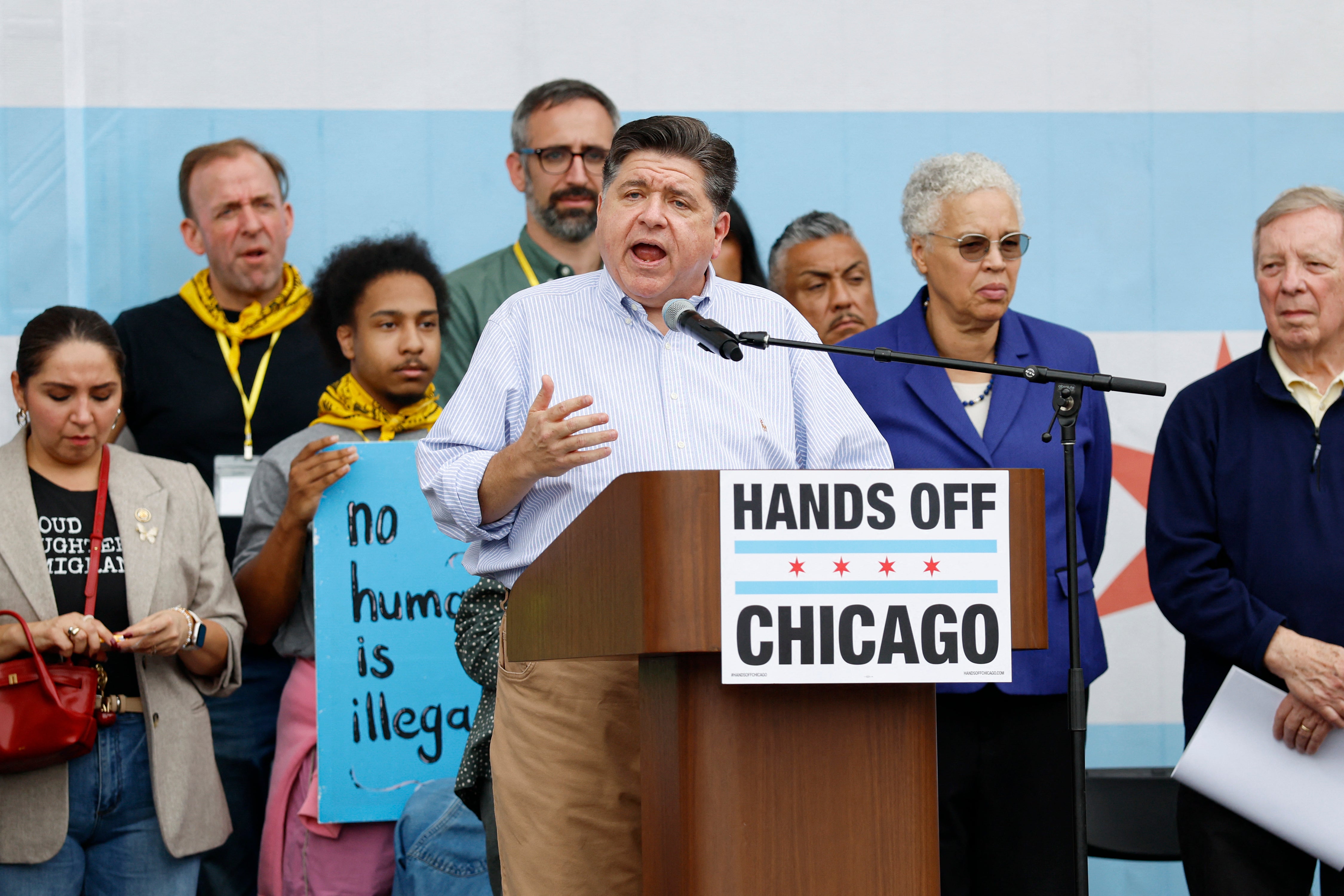 The detonation of weapon unit successful Chicago this past play was each Trump needed to spell disconnected connected Illinois Governor JB Pritzker (pictured center) and Chicago, 2 acquainted targets of his crossed some administrations