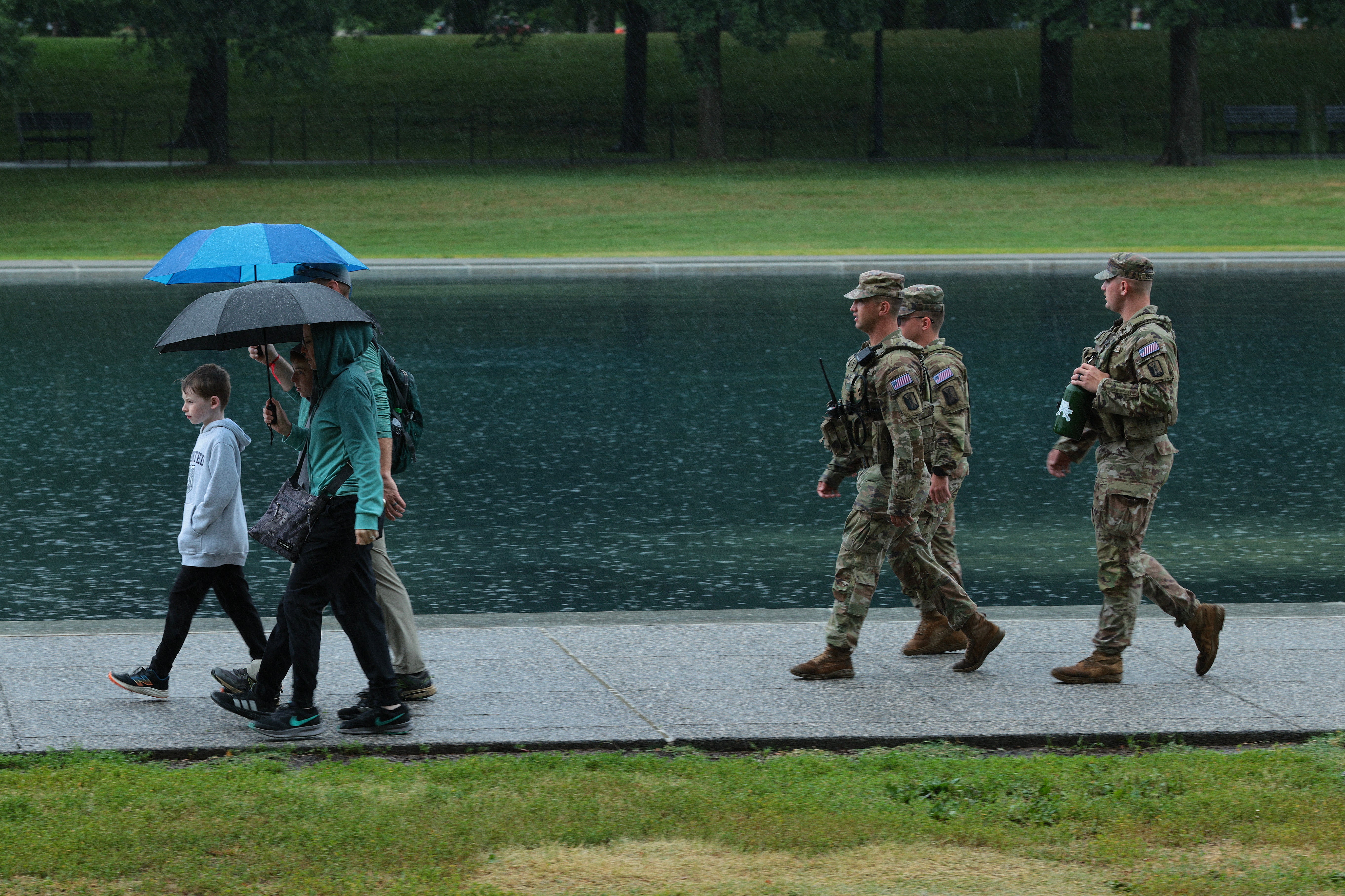 The waters of nan Reflecting Pool turned greenish erstwhile again this week amid nan adminsitration's efforts to clear algae from nan pool