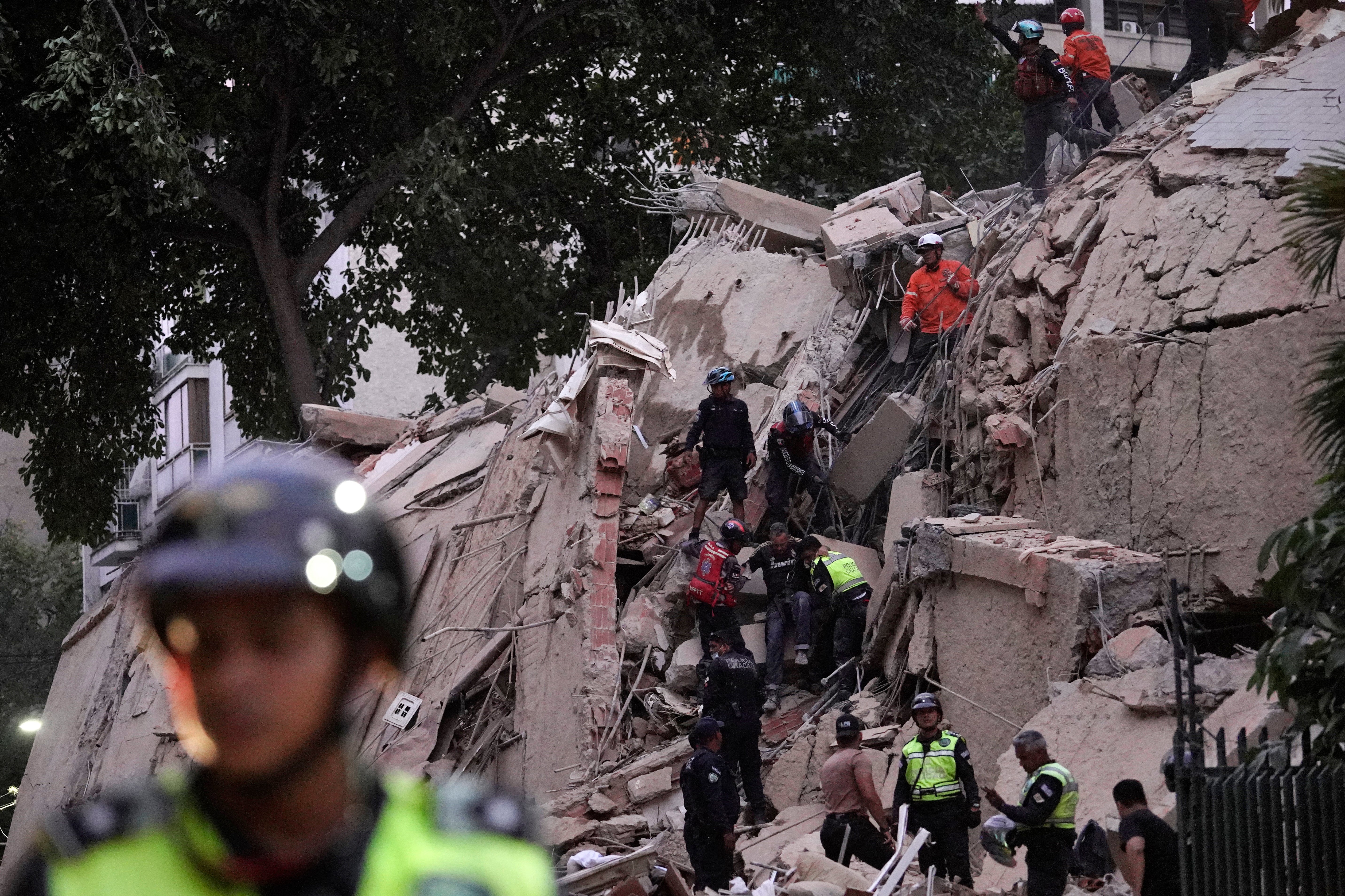 People evacuated swaying buildings successful Caracas and remained outside