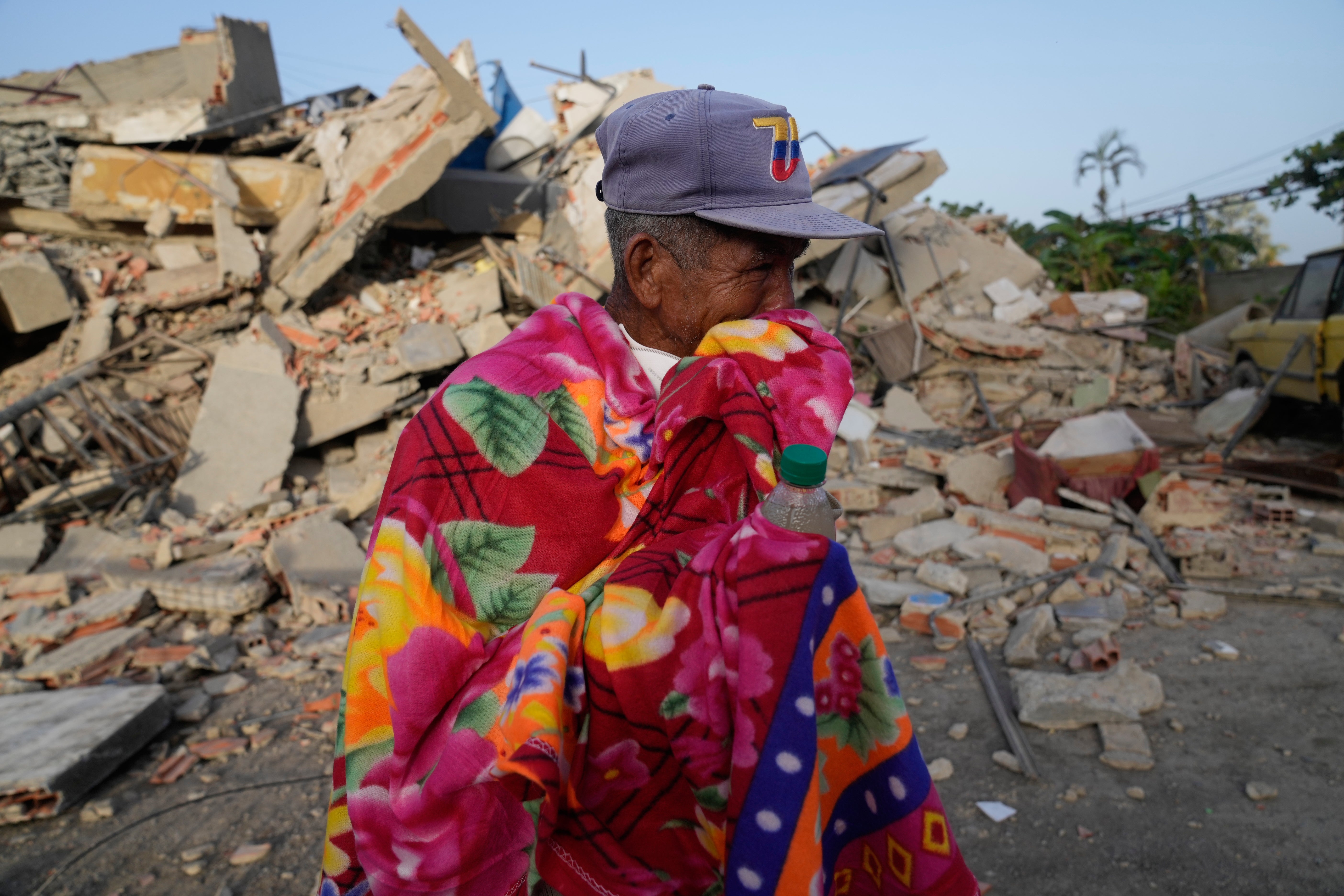 A man stands successful beforehand of a collapsed building 2 days aft an earthquake struck La Guaira, Venezuela, Friday, June 26, 2026.