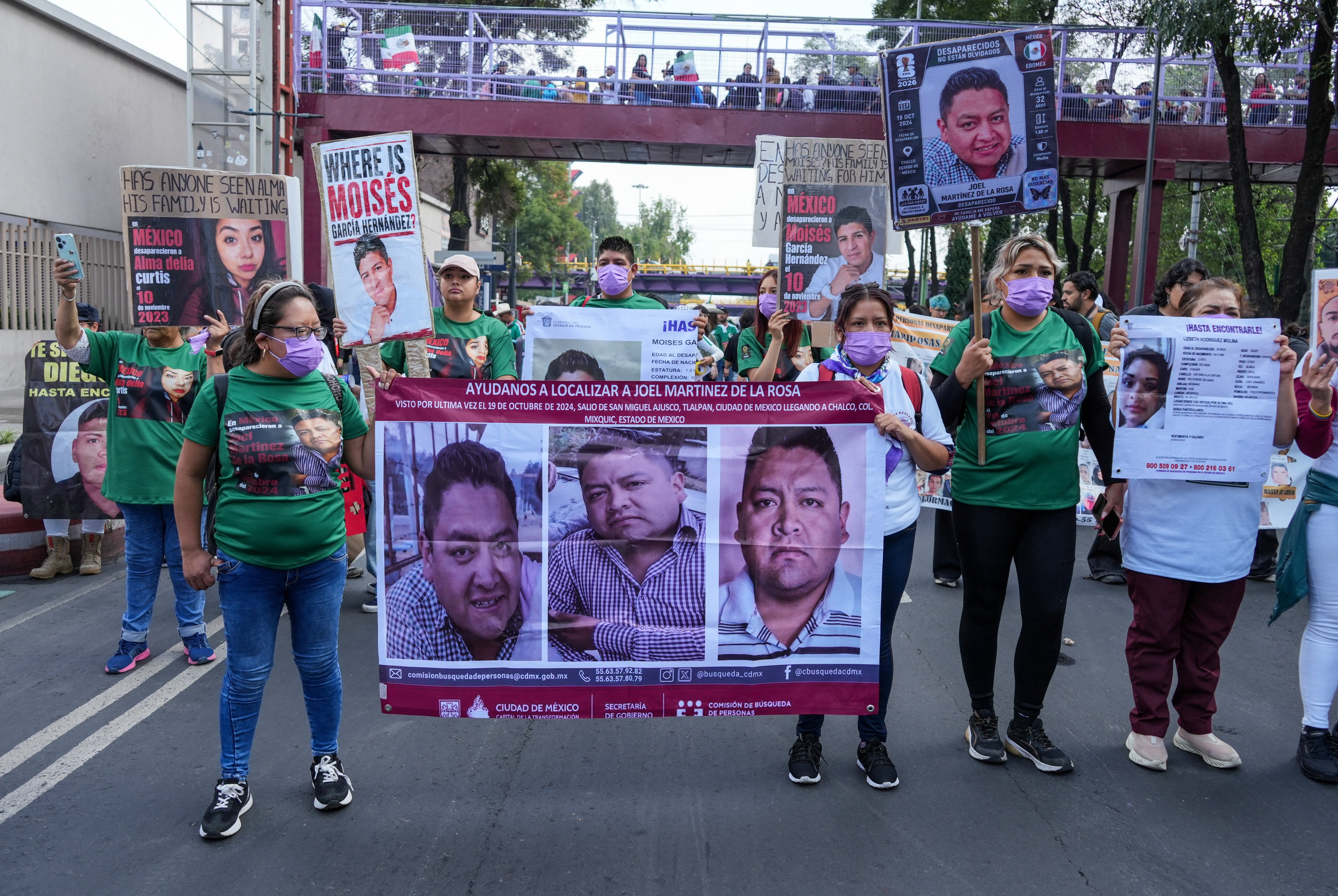 Search collectives for missing people, whose sons and daughters are victims of Mexico's supplier cartels, return portion successful a protestation march up of nan World Cup’s opening lucifer successful Mexico City