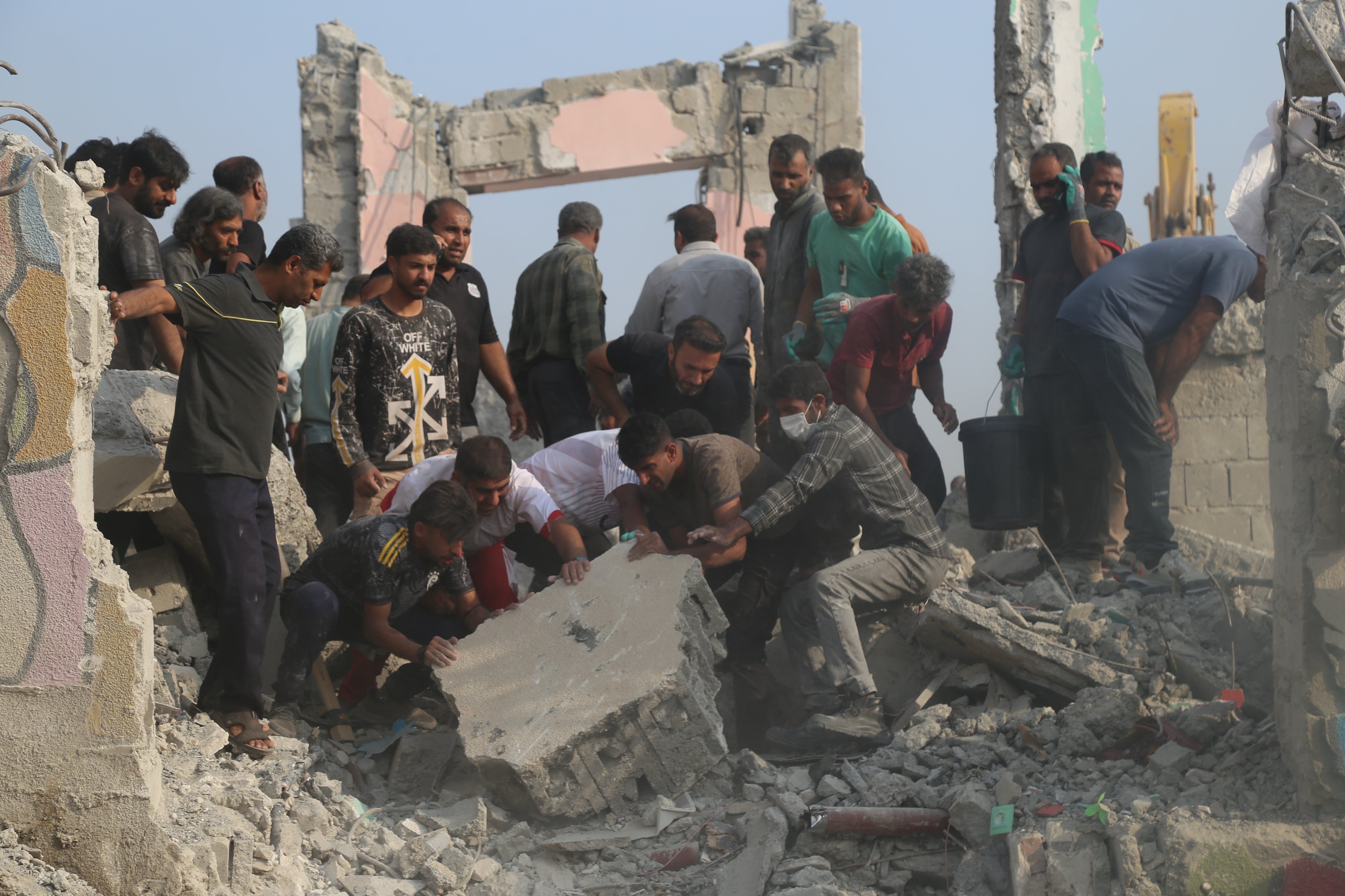 Rescue workers and residents hunt done nan rubble successful nan aftermath of a onslaught connected an simple schoolhouse successful Minab, Iran, Saturday, Feb. 28, 2026