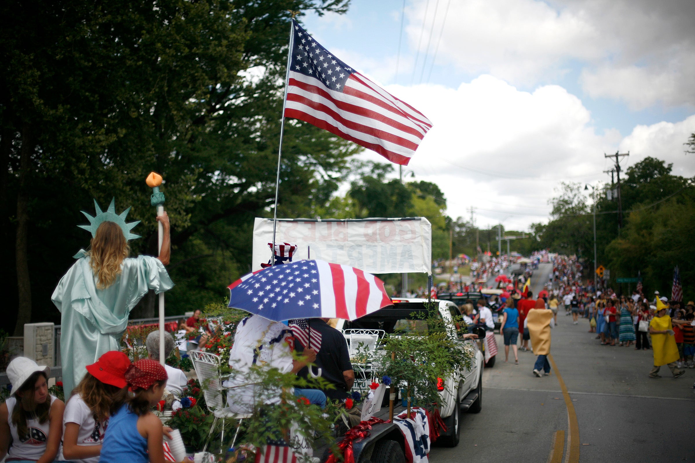 This year’s procession down Ranch Road 12 features more than 100 entries — the largest in Wimberley history — led by local veterans in a vintage Army truck