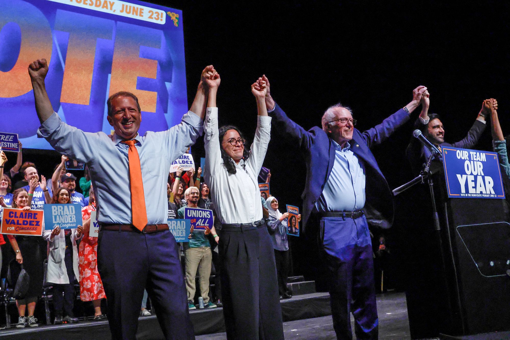  Sanders, connected June 18, joins hands pinch Mamdani and progressive legislature candidates Brad Lander and Claire Valdez, who some won House primaries past month