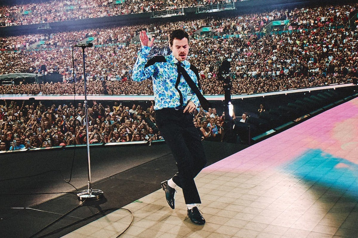 Photo: The Independent How Harry Styles surpassed the Wembley performance record