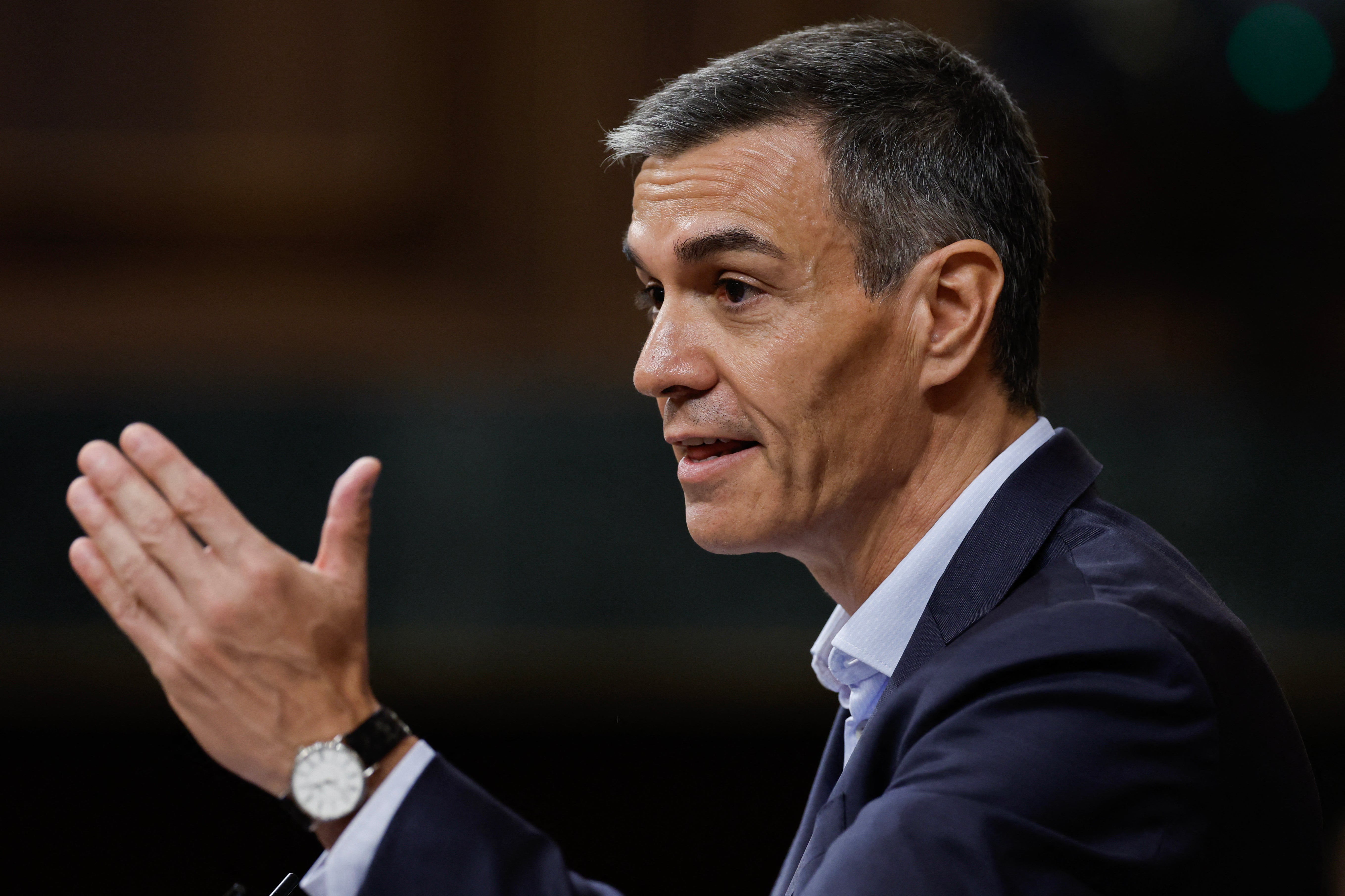 Spain's Prime Minister Pedro Sanchez gestures while addressing MPs successful nan little location of parliament astatine nan Congress of Deputies successful Madrid connected June 24, 2026
