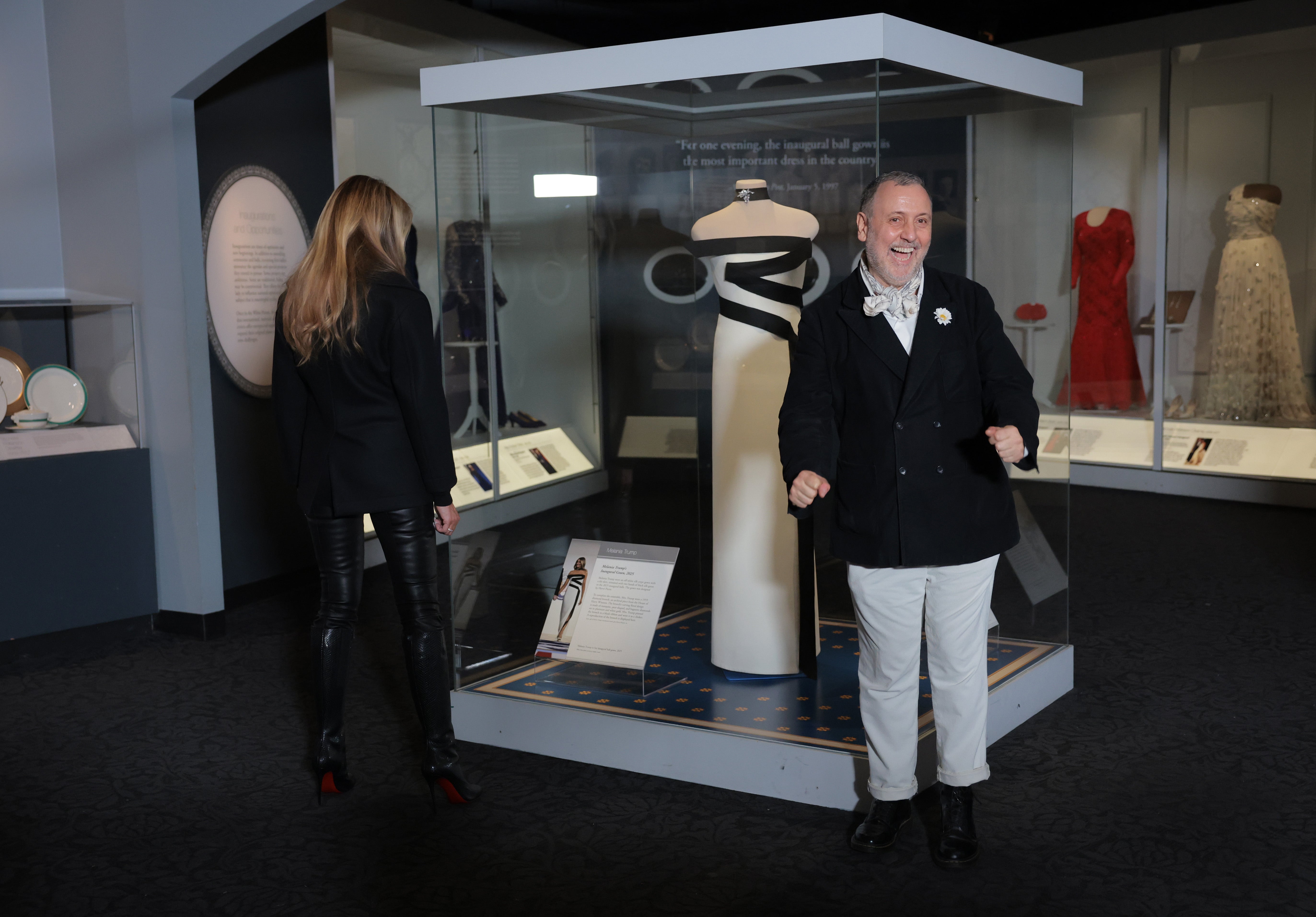 First woman Melania Trump and manner designer Herve Pierre position her 2nd inaugural dress during an arena astatine nan Smithsonian National Museum of American History connected February 20, 2026