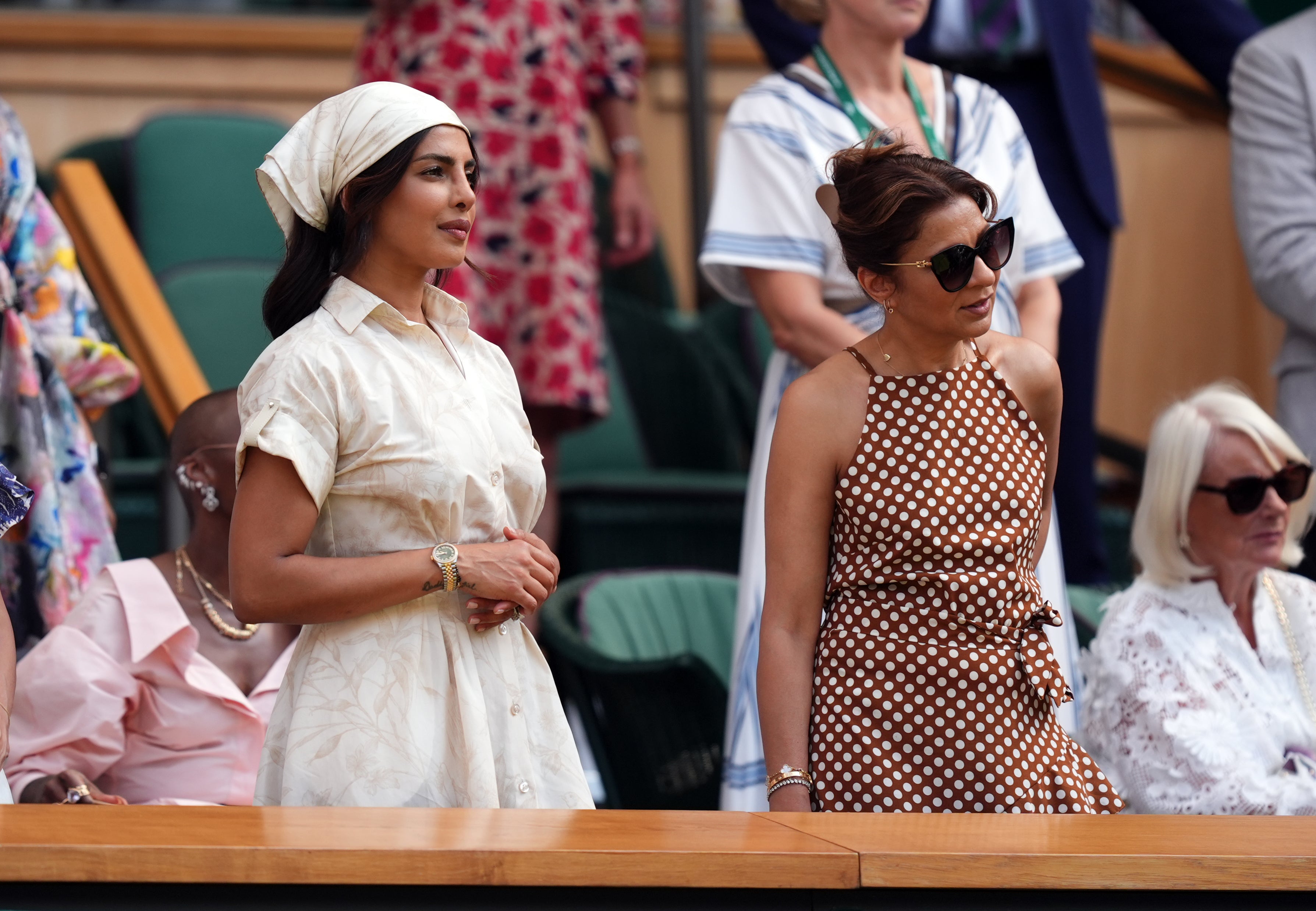 Priyanka Chopra Jonas, left, in the royal box on day 11