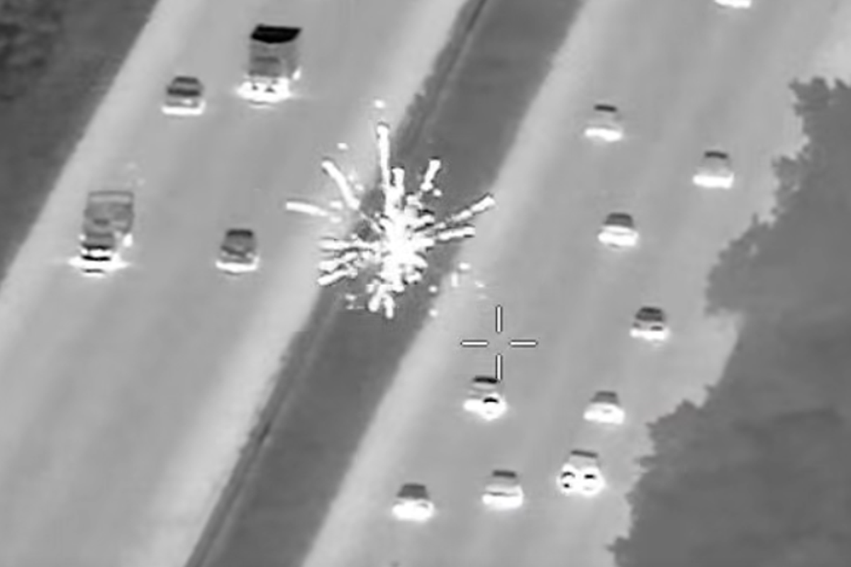 Shocking moment passenger shoots fireworks at cars on Florida highway