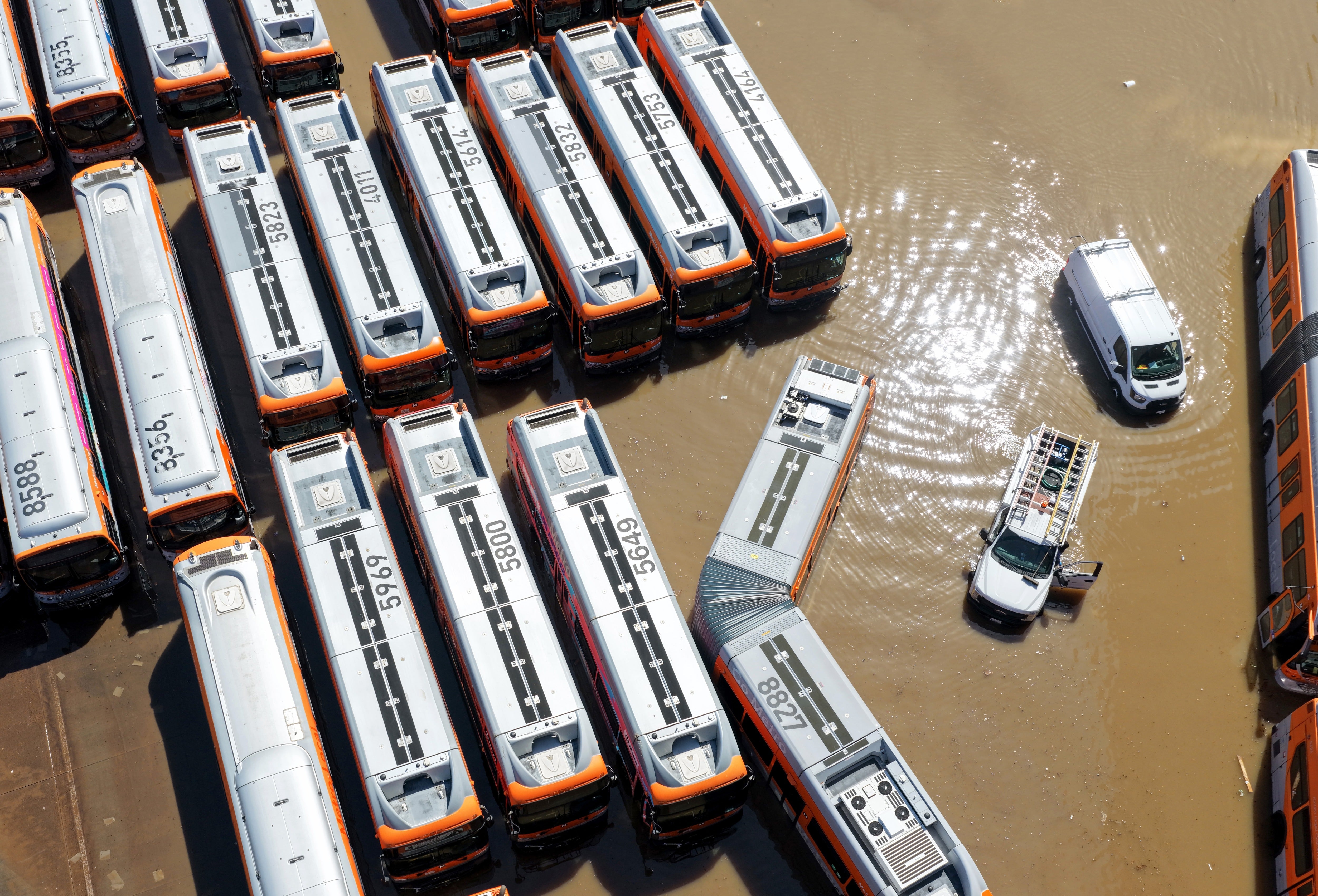 The rupture led thousands of gallons of h2o to cascade down nan streets of West Hollywood, leaving a fleet of buses submerged