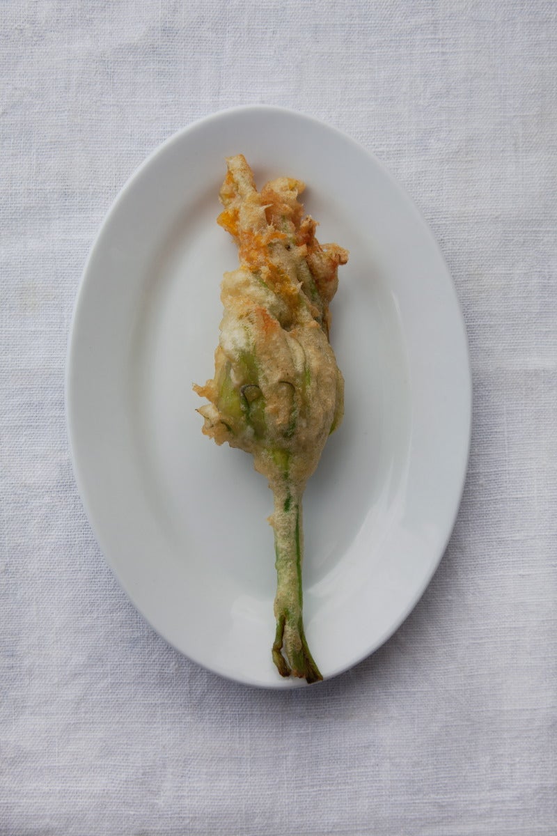 A Roman classic with molten mozzarella, salty anchovy and a crisp, airy shell