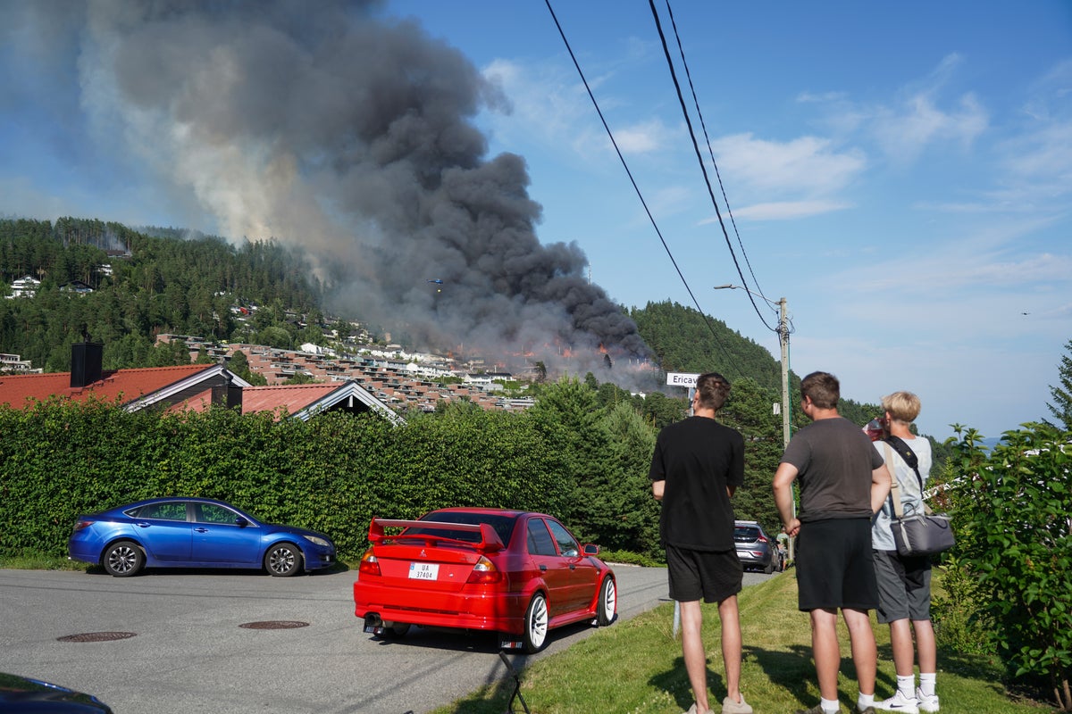 ‘Not under control': Firefighters battle largest blaze in Norway's history as 100 homes destroyed