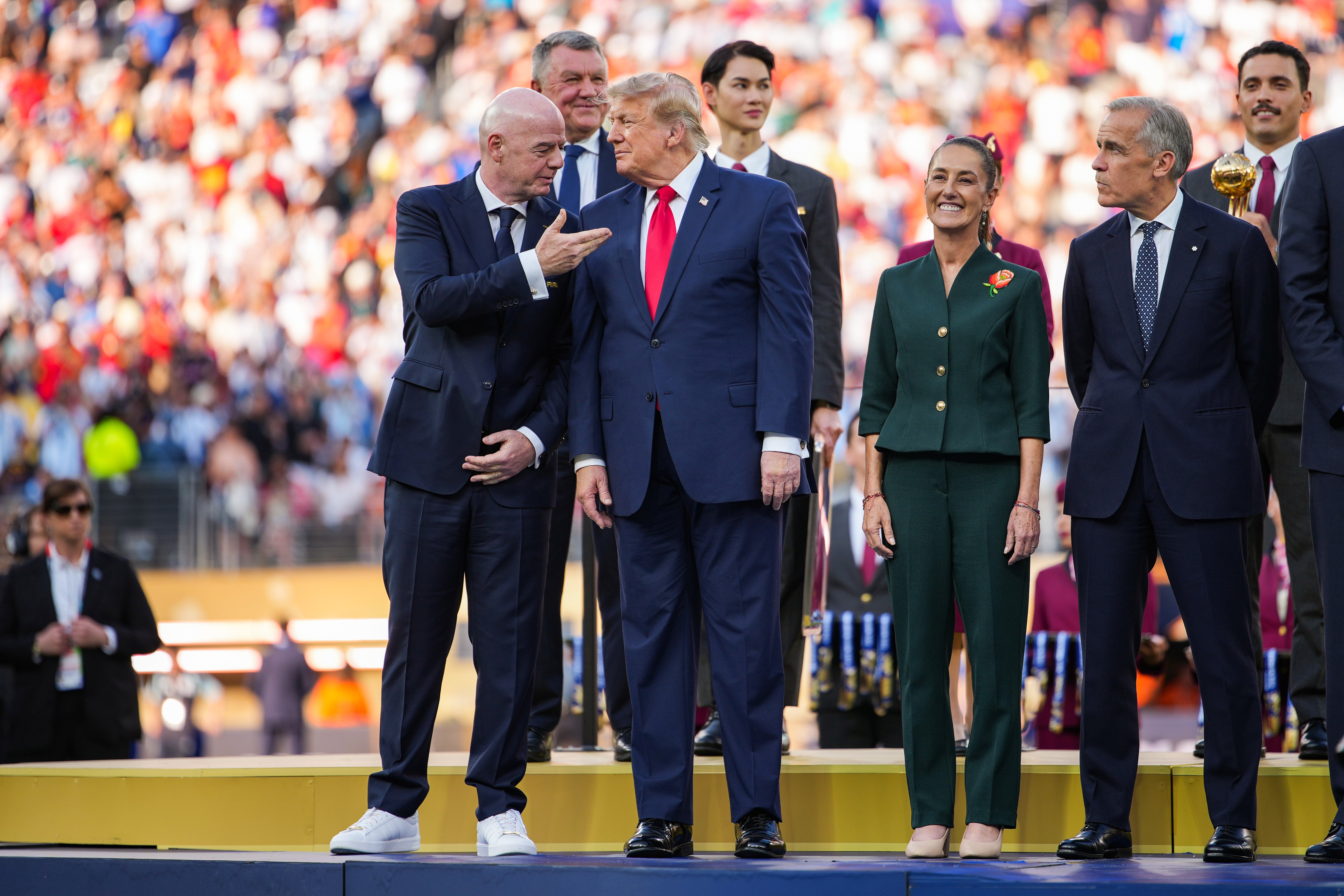 Trump and Carney astatine nan World Cup last successful New Jersey, wherever nan 2 men joined Mexican President Claudia Sheinbaum successful representing nan 3 big nations