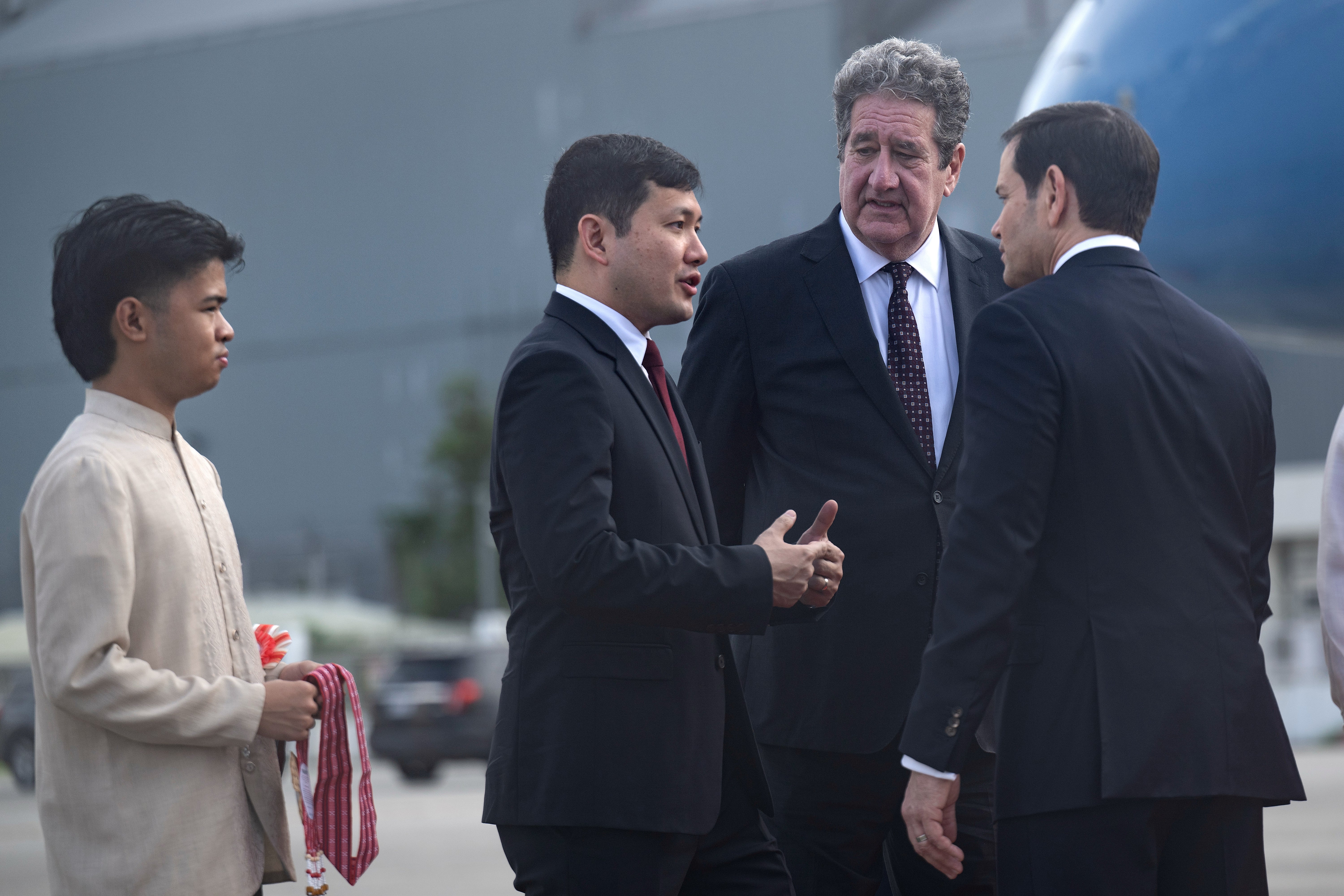 U.S. Ambassador to nan Philippines Lee Lipton, 2nd right, listens to U.S. Ambassador to ASEAN Kevin Kim, 2nd left, speaking pinch Rubio